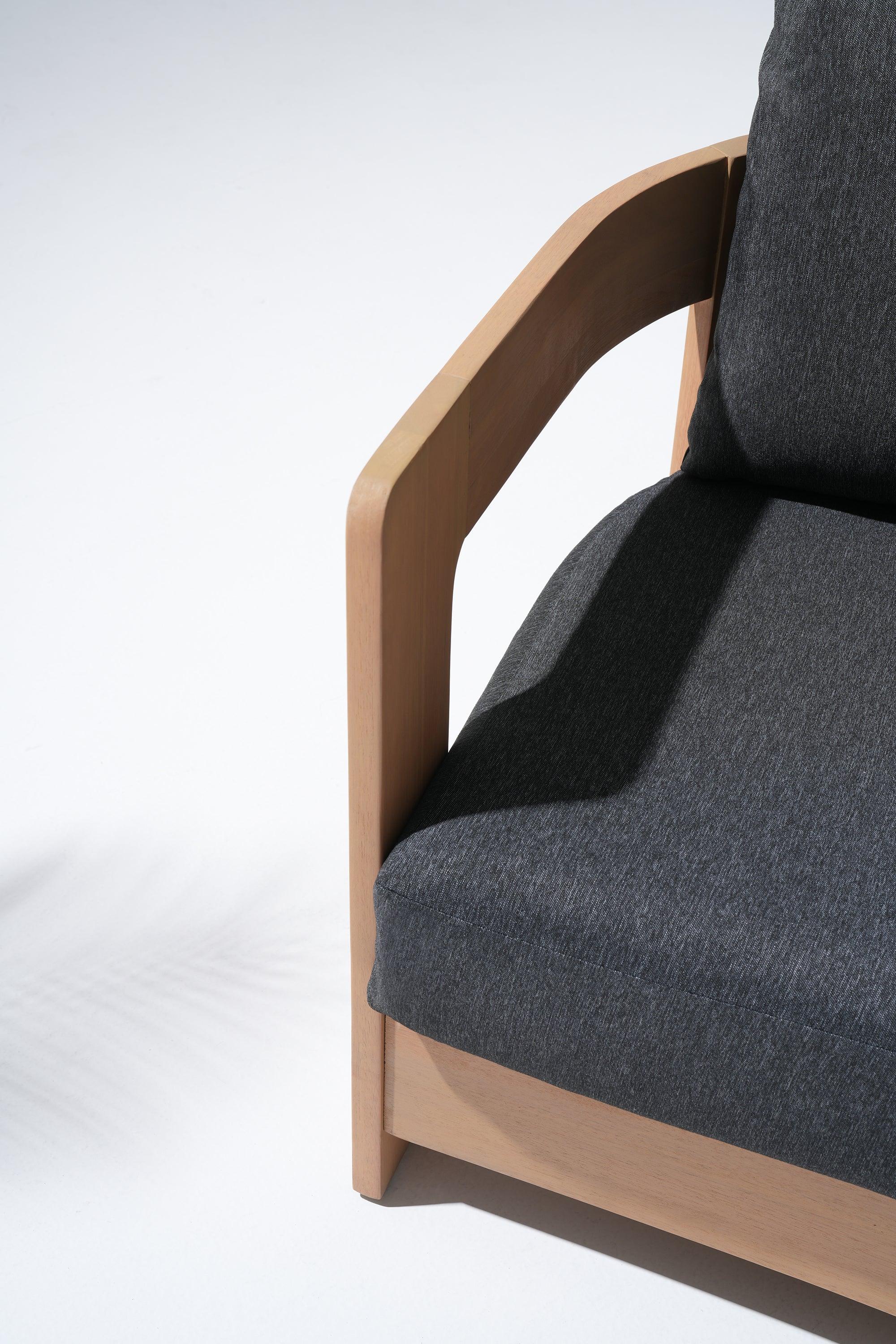 Chair with black cushion and wooden frame