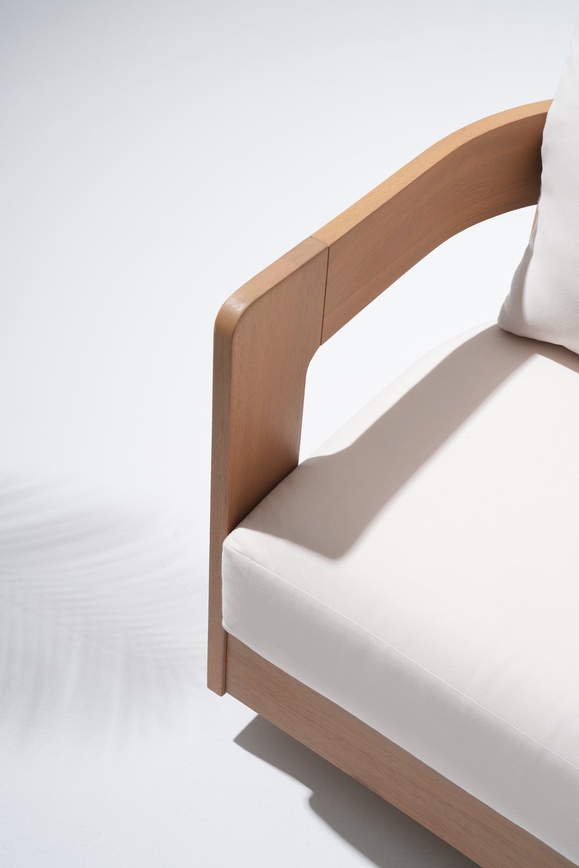 Wooden armchair with white cushion detail #Color_White