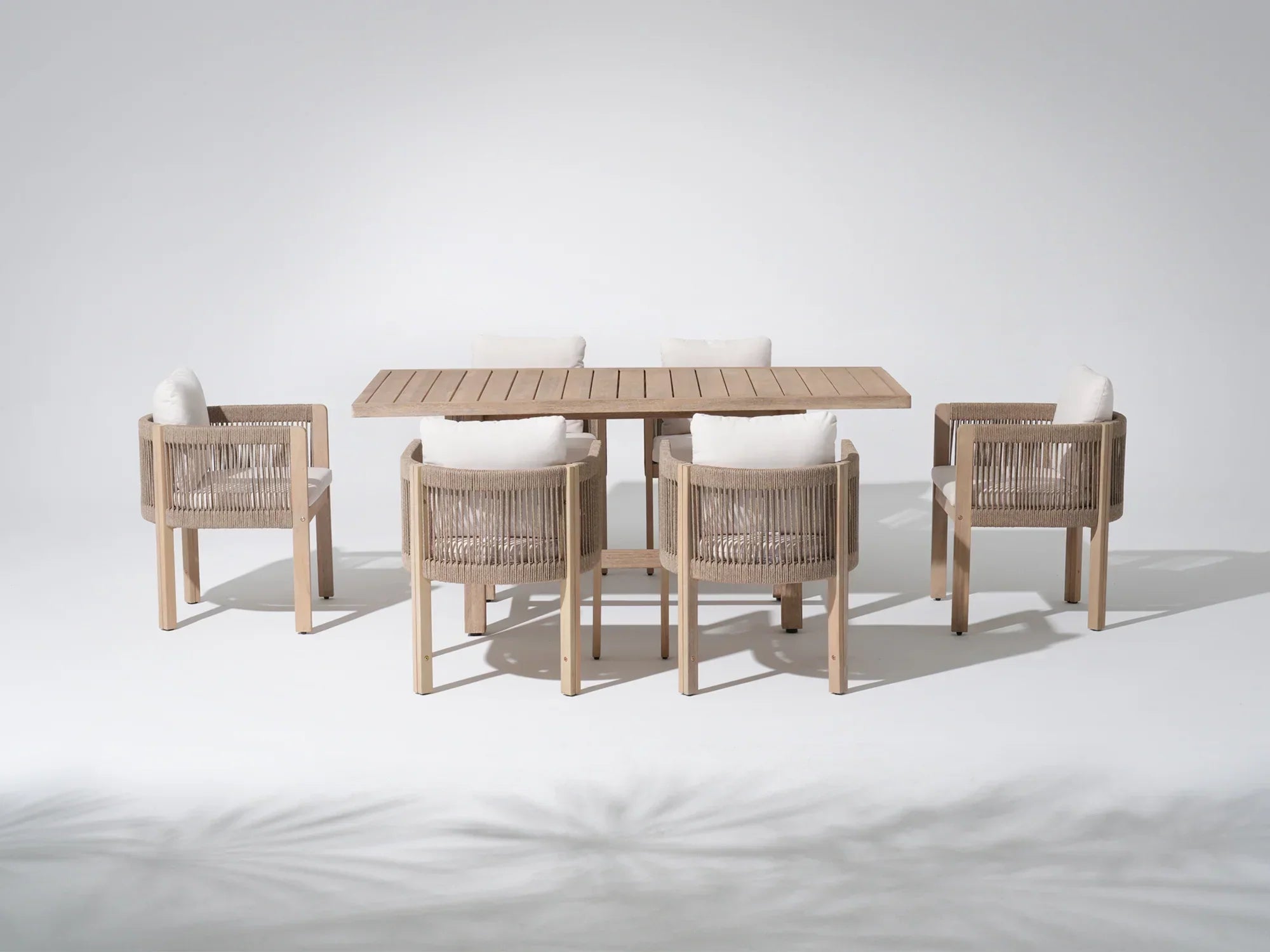 Outdoor furniture dining set for 6 with a acacia wooden table and four matching woven rope curved chairs - Jardina Premium Modern Outdoor Dining Furniture