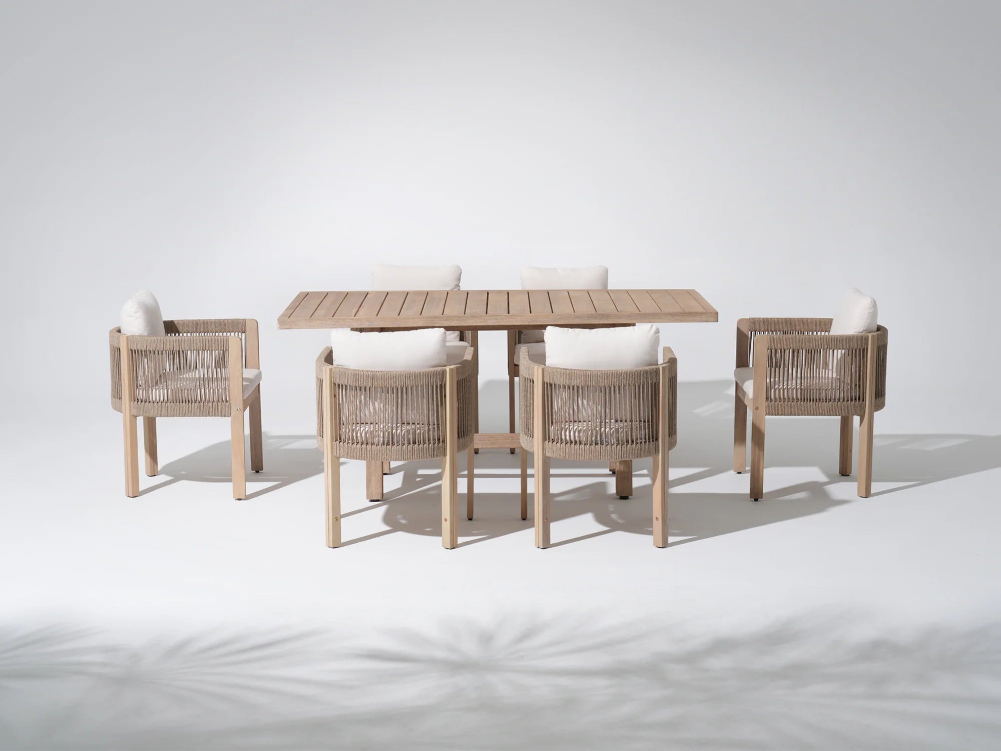 Outdoor furniture dining set for 6 with a acacia wooden table and four matching woven rope curved chairs - Jardina Premium Modern Outdoor Dining Furniture