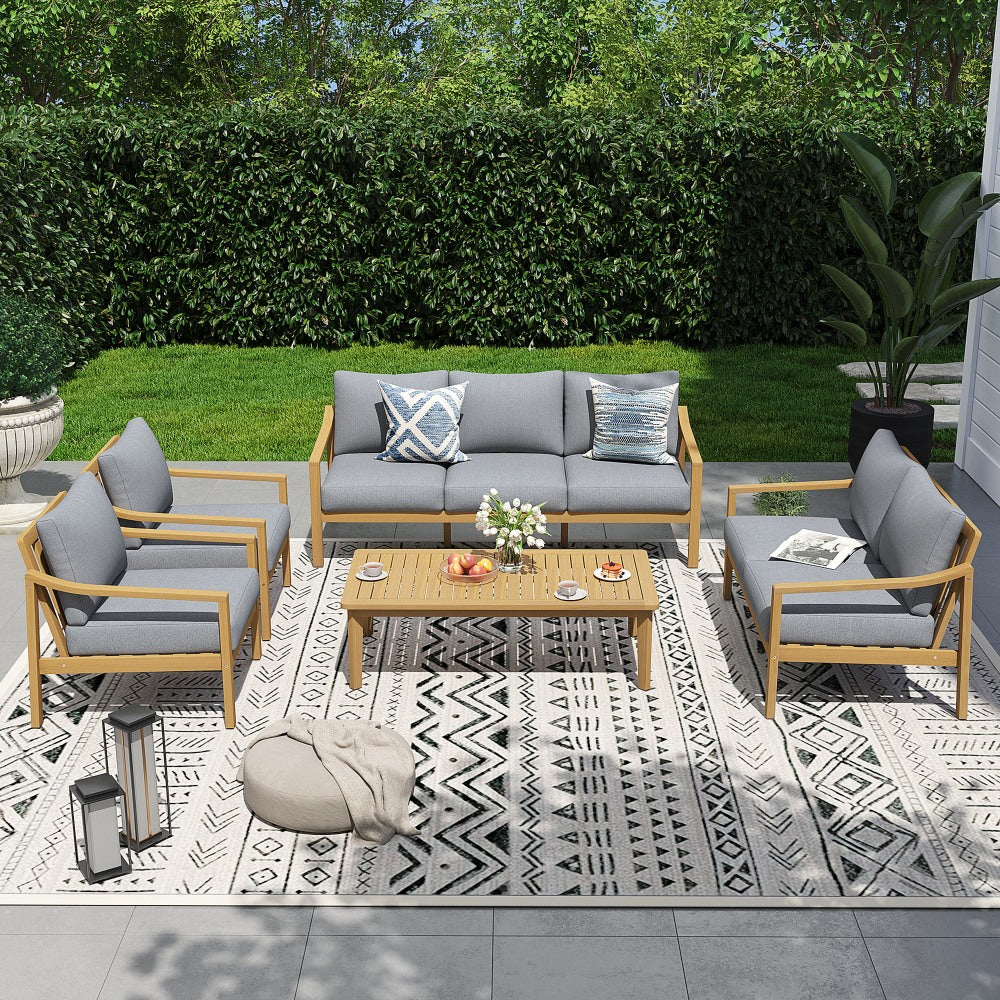 Noto 7 seats Outdoor patio furniture set with gray cushions and wooden frames on a patterned rug- Jardina Modern Premium Patio Outdoor Furniture