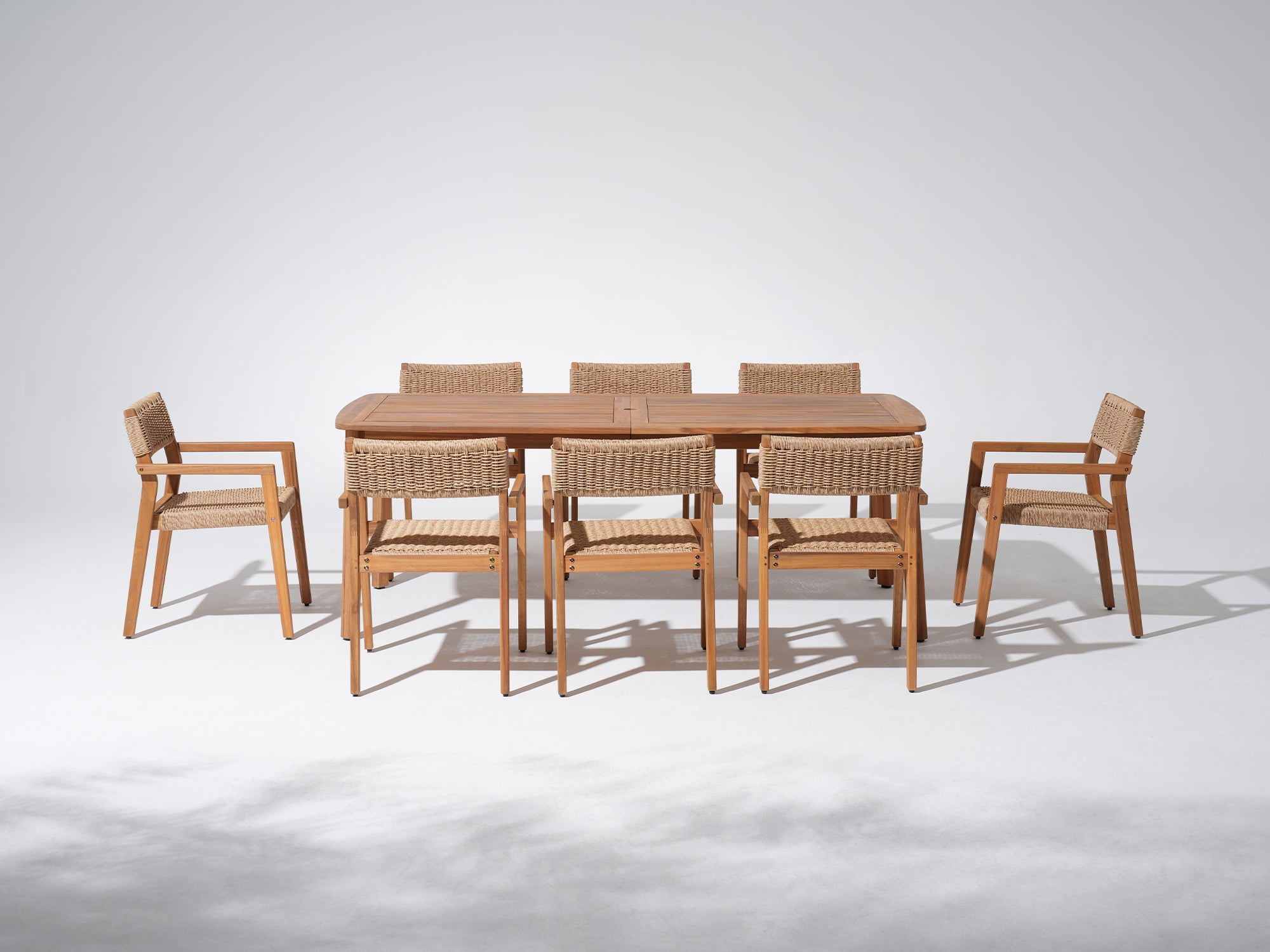 acacia wood and wicker Outdoor furniture dining set for 8 people, a rectangular dining table with umbrella hole and 6 matching armchairs - Jardina Premium Modern Outdoor Dining Furniture