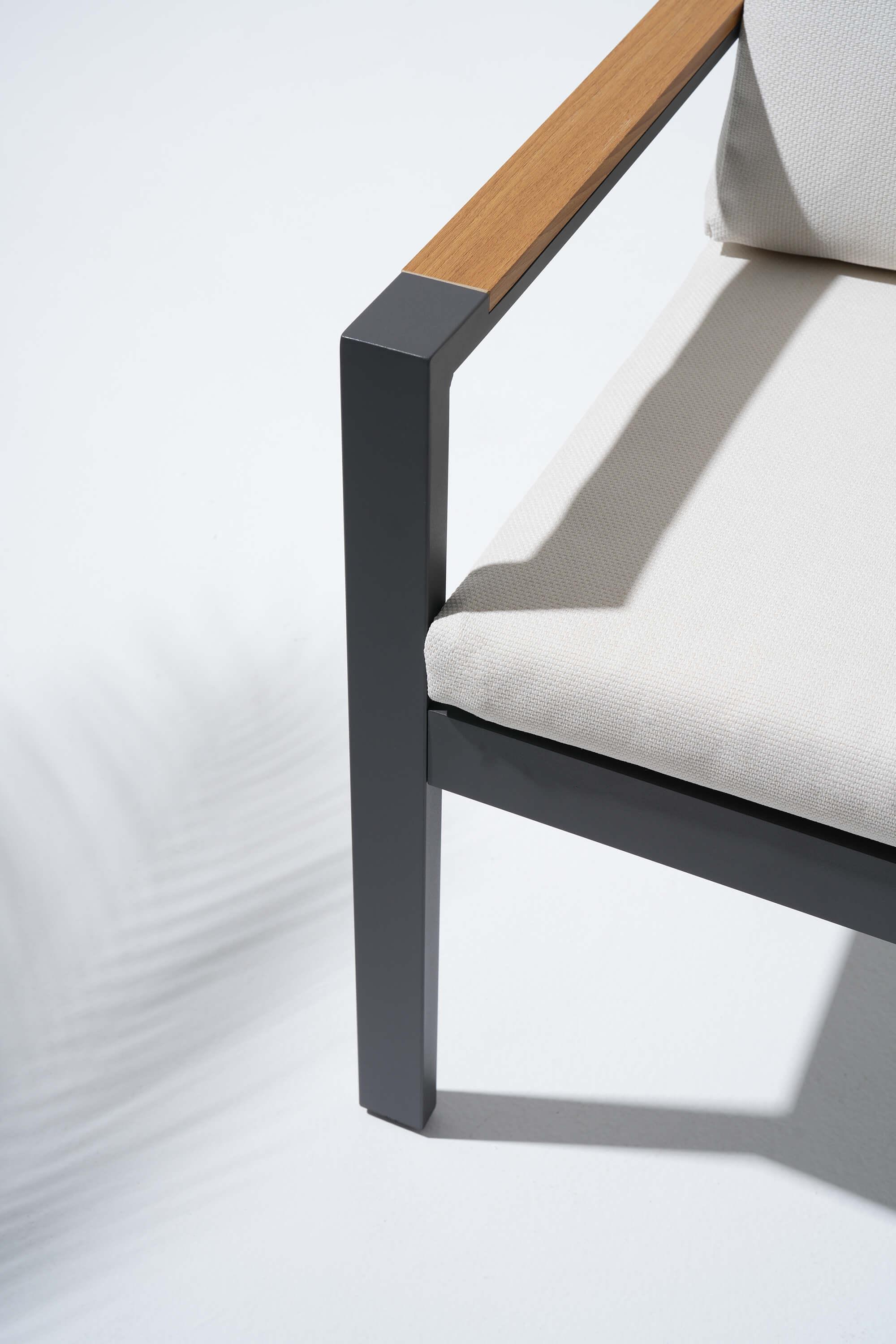 Chair with wooden armrest and metal frame