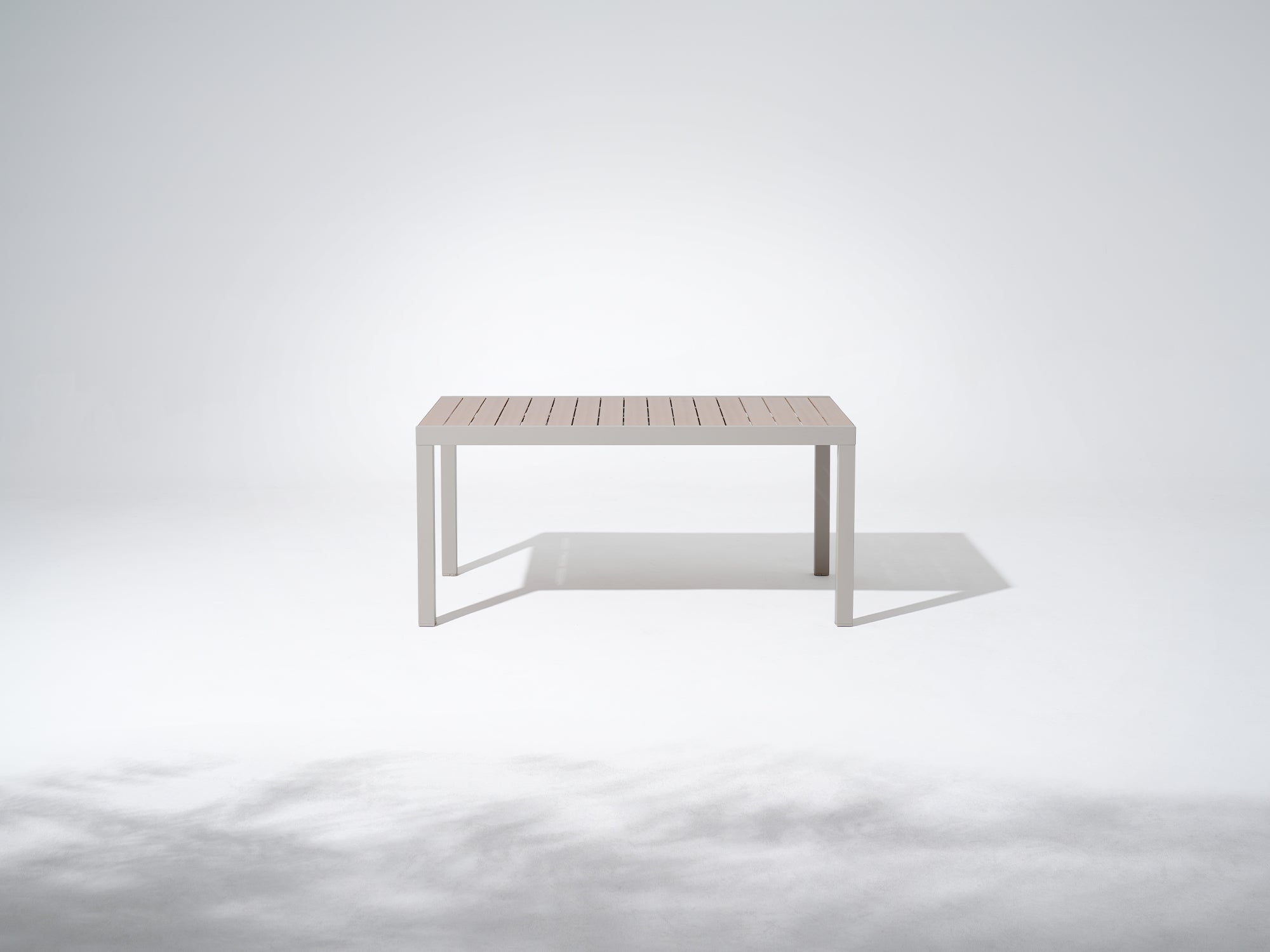 Minimalist white aluminum outdoor dining table with wooden tabletop