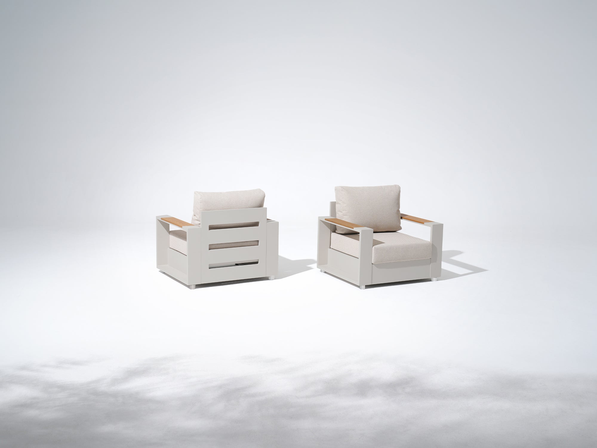 Two modern white aluminum lounge chairs - Jardina outdoor modern premium patio furniture