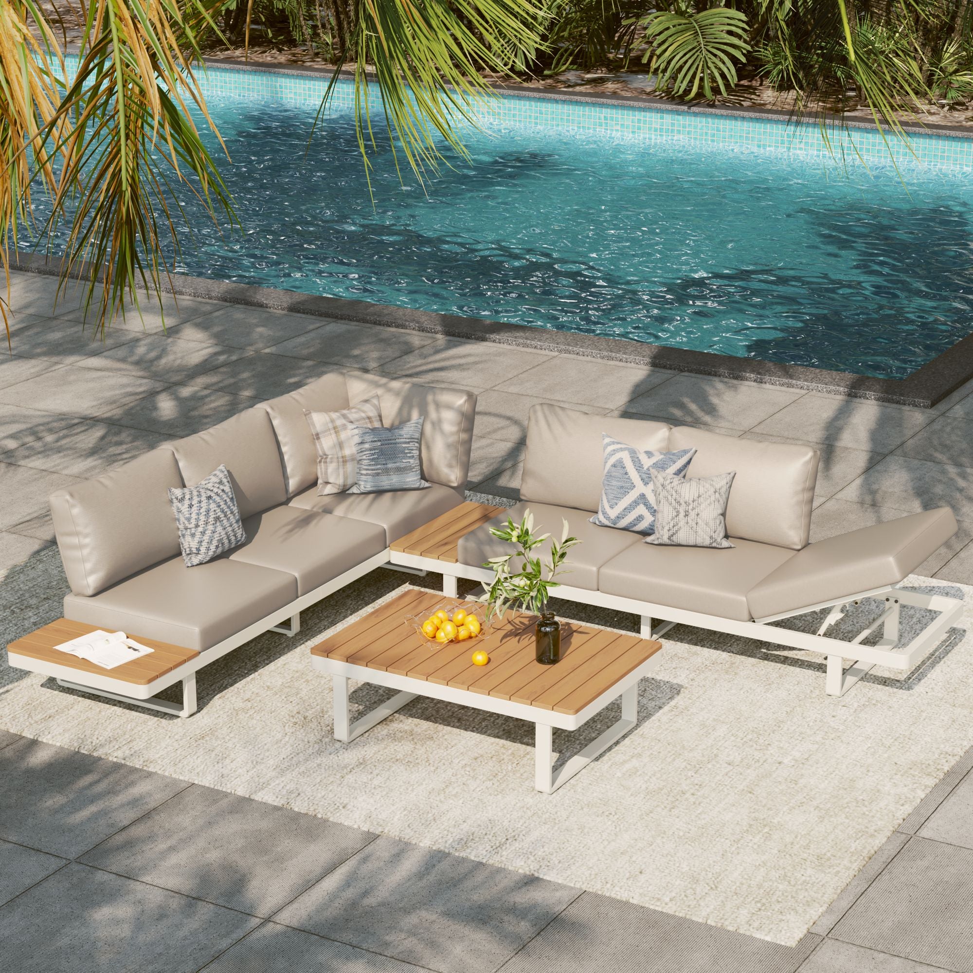 Addison white aluminum outdoor sectional sofa patio furniture set with a woodtop coffee table by a pool