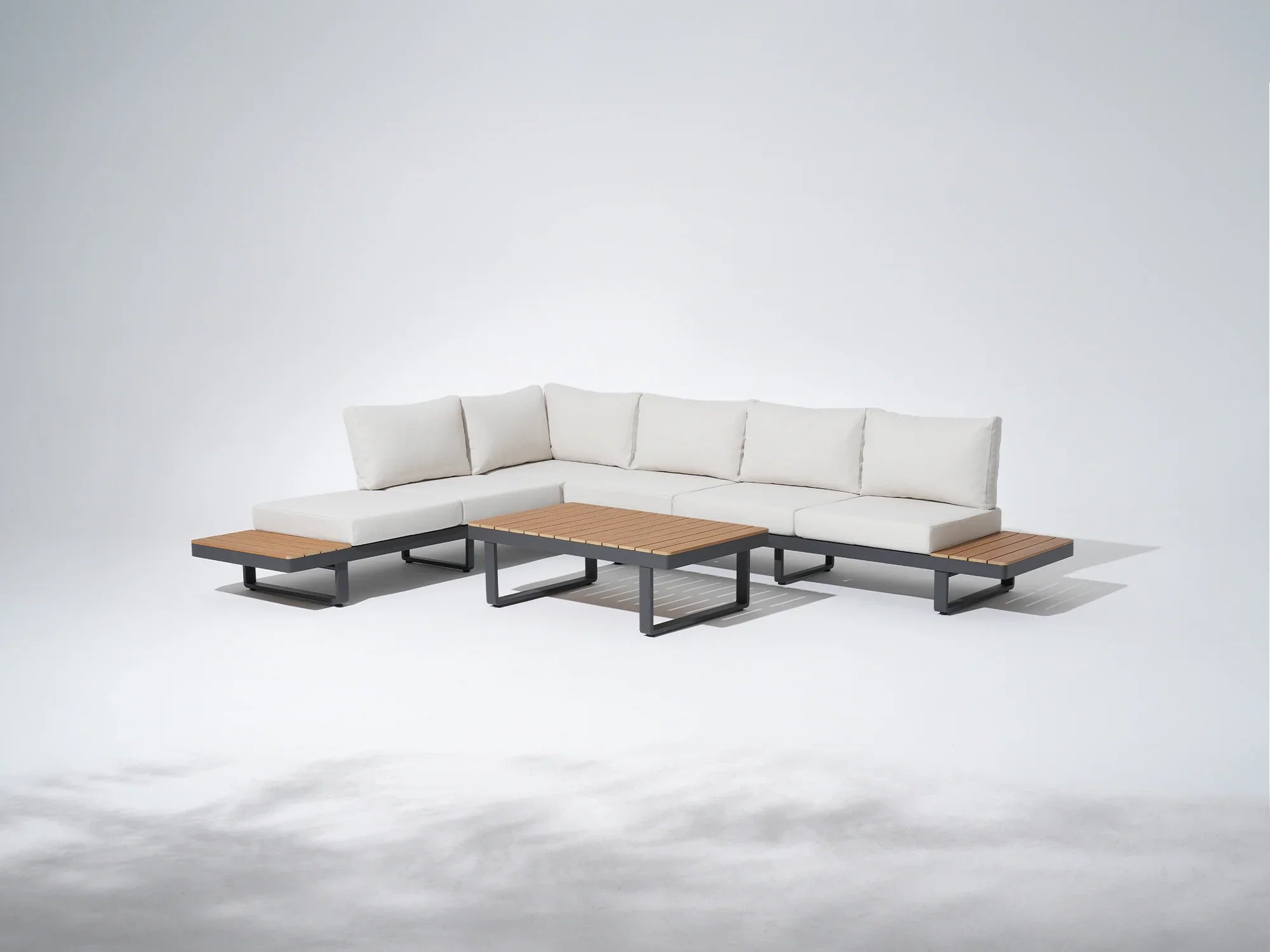 Addison Sectional outdoor sofa with wooden tables, dark grey aluminum frame and thick cushions