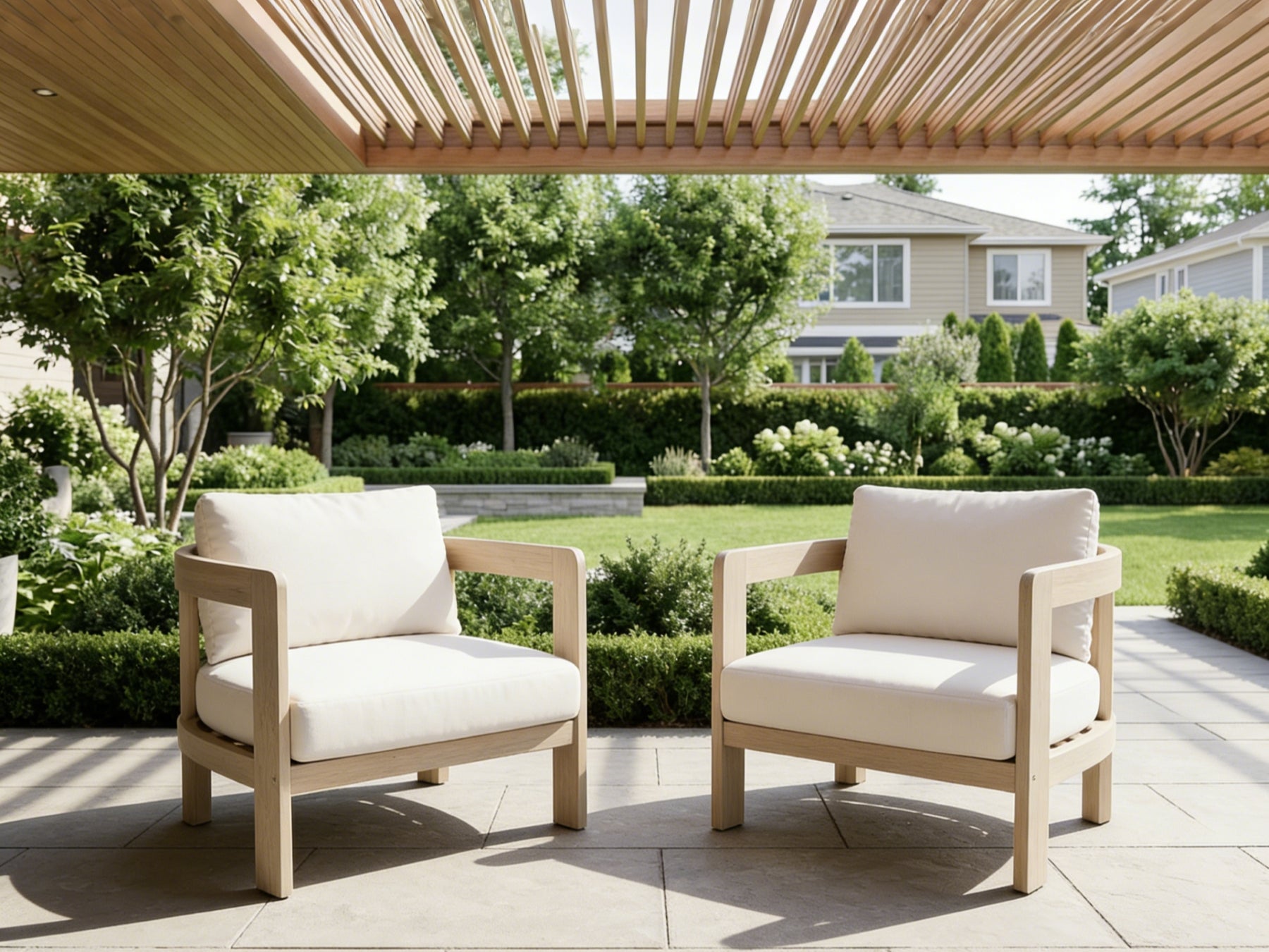Two acacia wooden sofa chairs with white cushions under a wooden pergola - Jardina Modern Premium Outdoor Patio Furniture Sets