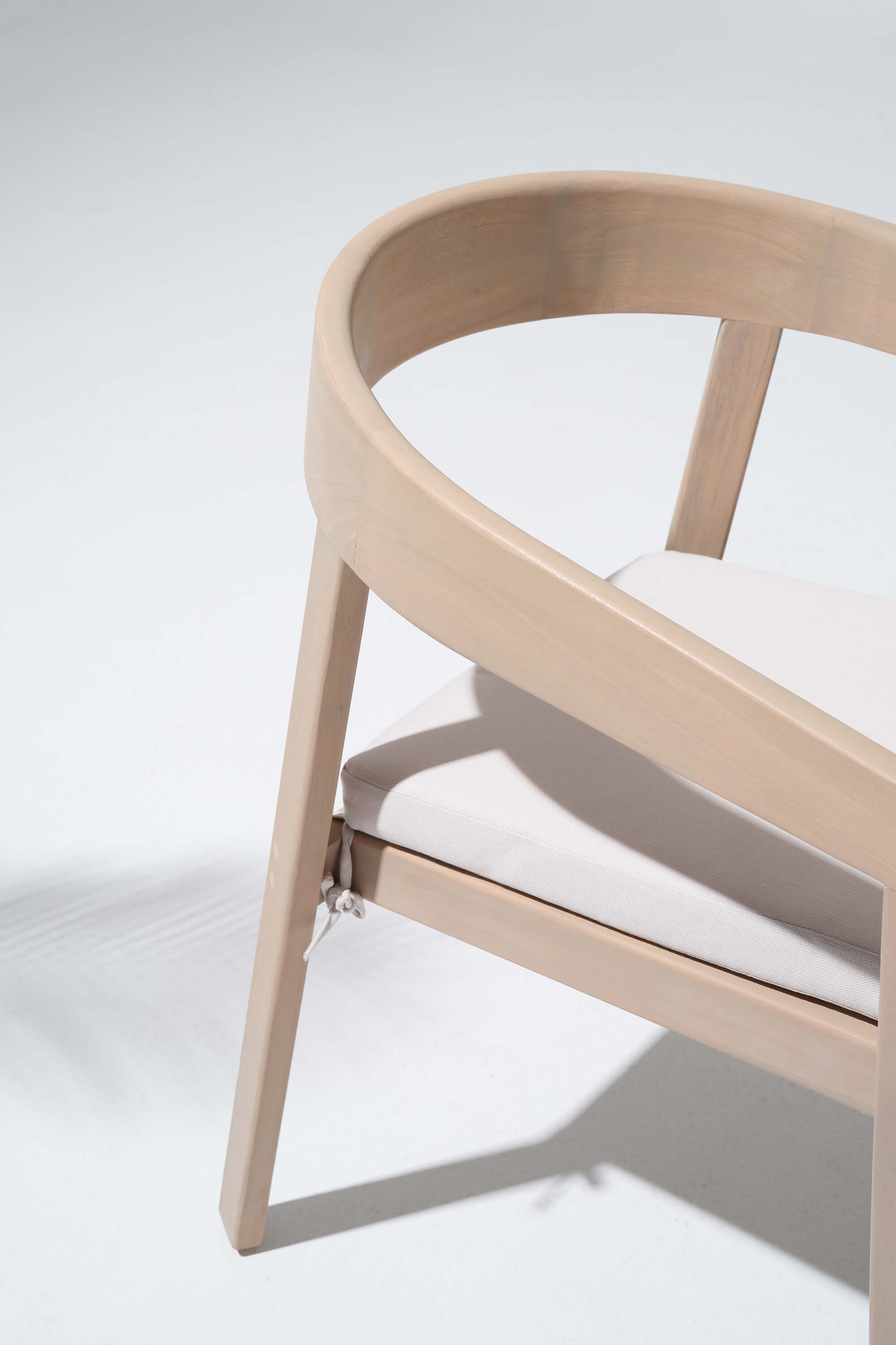 Eucalyptus Wooden chair with a white cushion