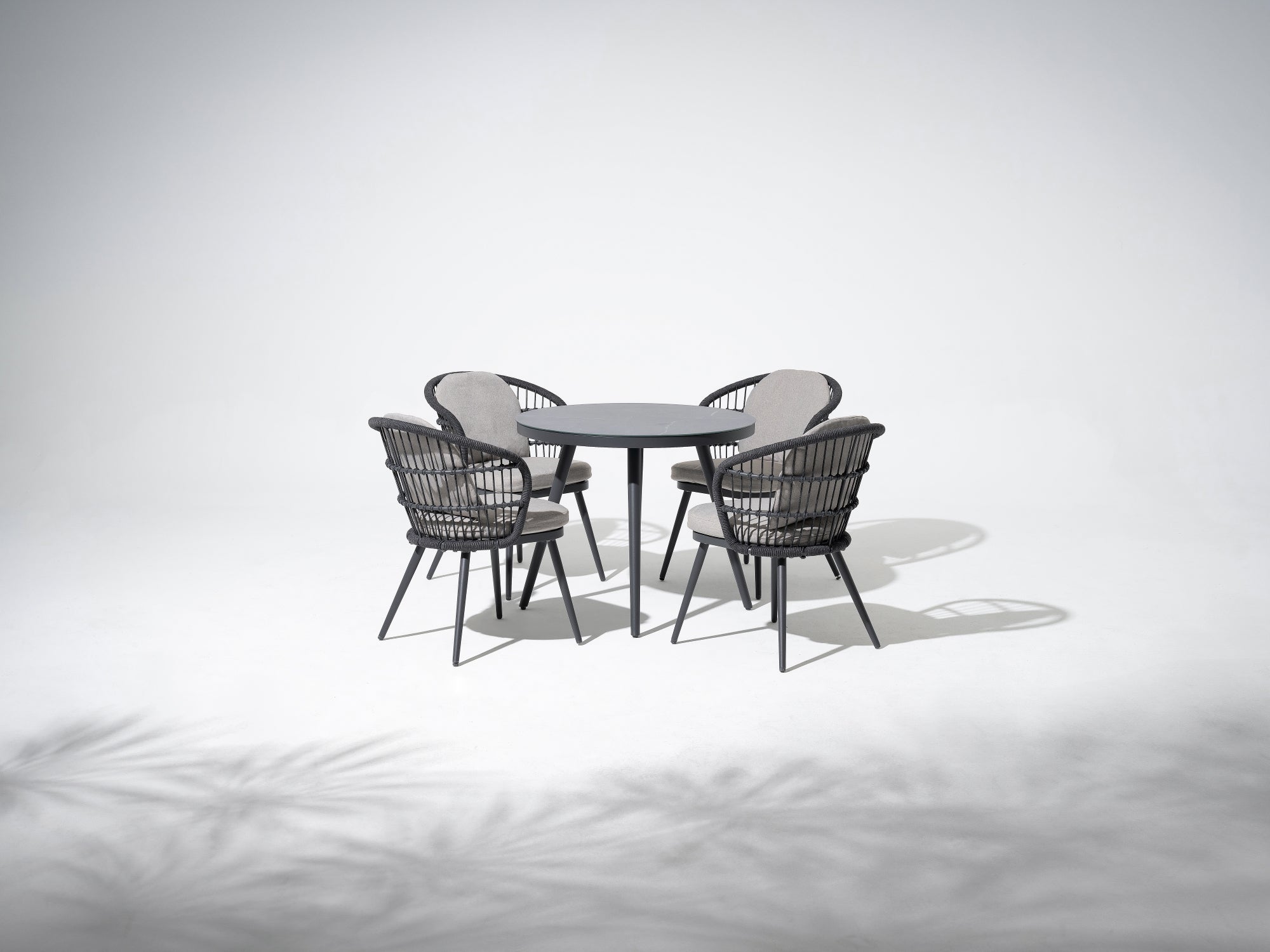 Aluminum round dining sets, 4 patio dining chairs with grey cushions, woven rope design, a round aluminum outdoor dining table - Jardina Outdoor Dining Furniture Set