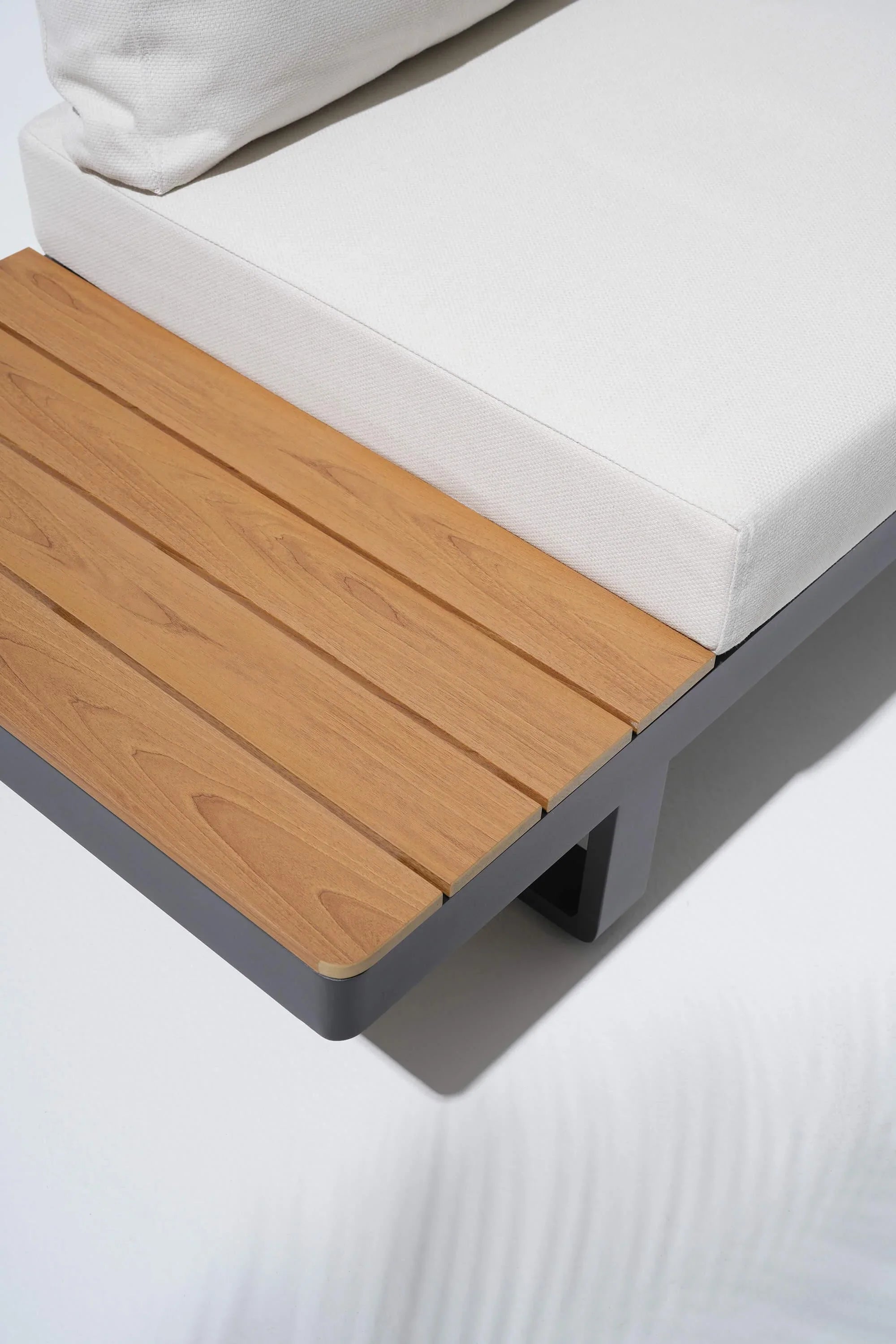 Addison outdoor sectional built-in wooden side table detail