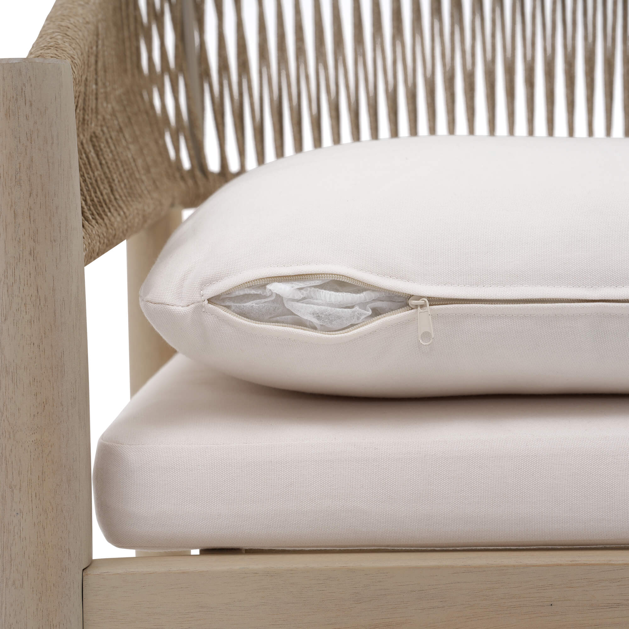 White pillow with a zipper on a acacia wooden chair