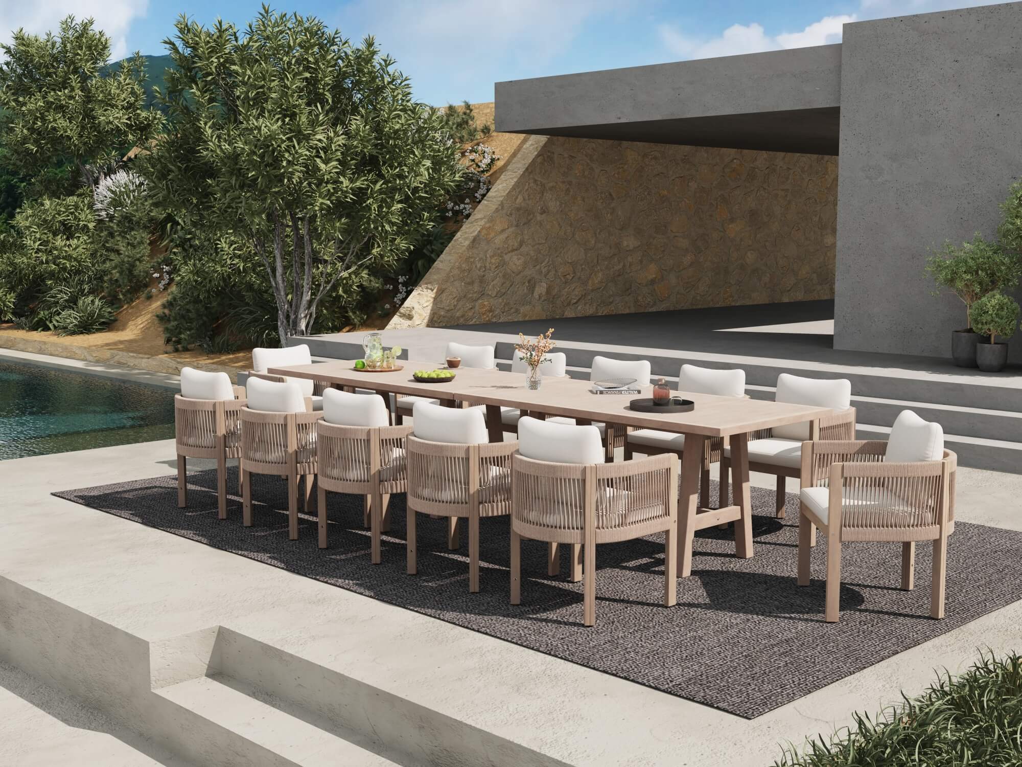 acacia wooden Outdoor dining set for 12 people with table and woven rope chairs near a poolside area - Jardina Premium Modern Outdoor Dining Furniture