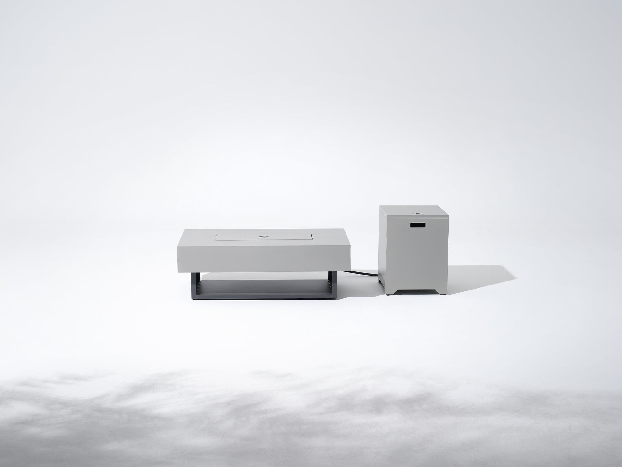 Two modern, light gray boxes on a white background
