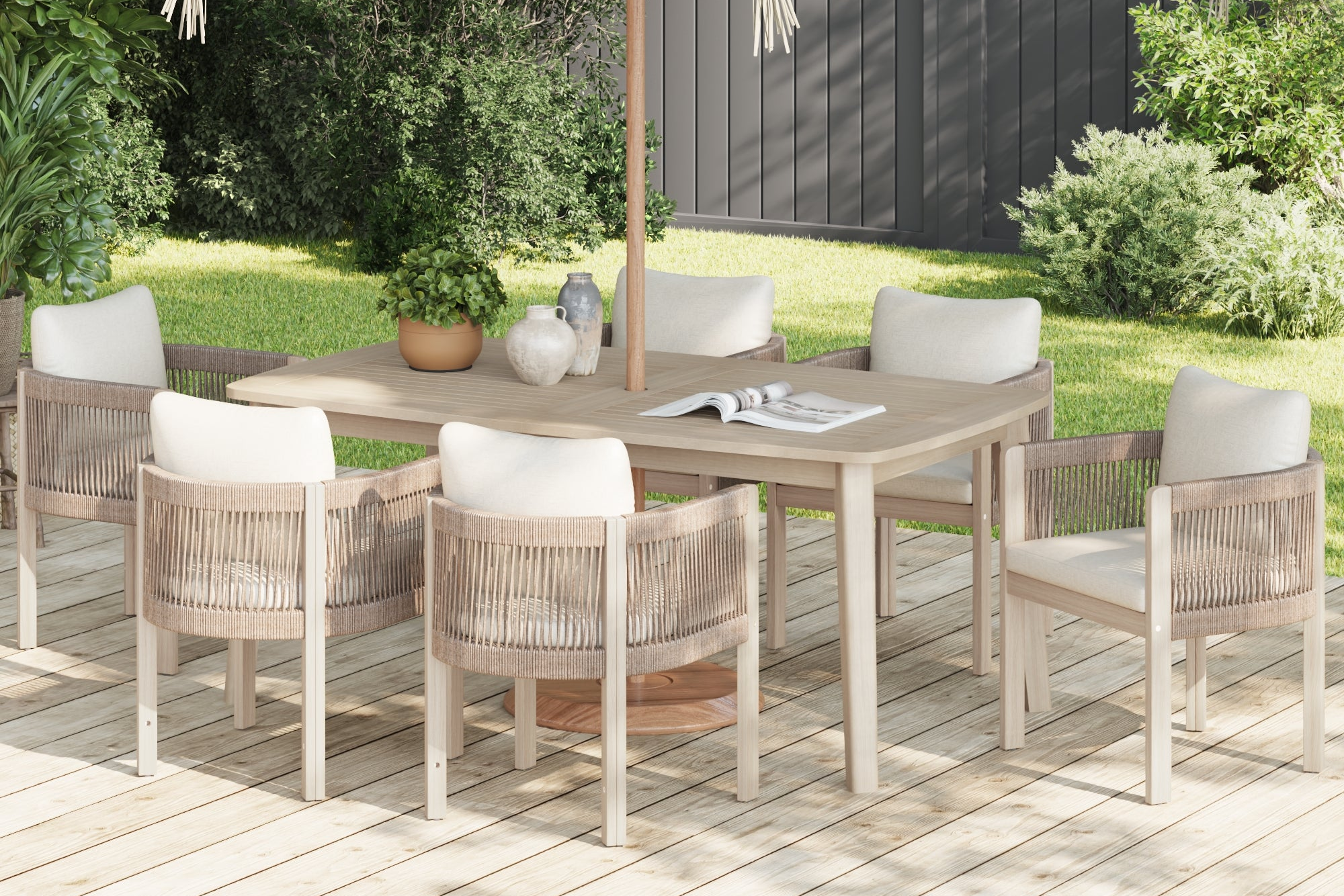 Outdoor dining set with table and chairs on a wooden deck