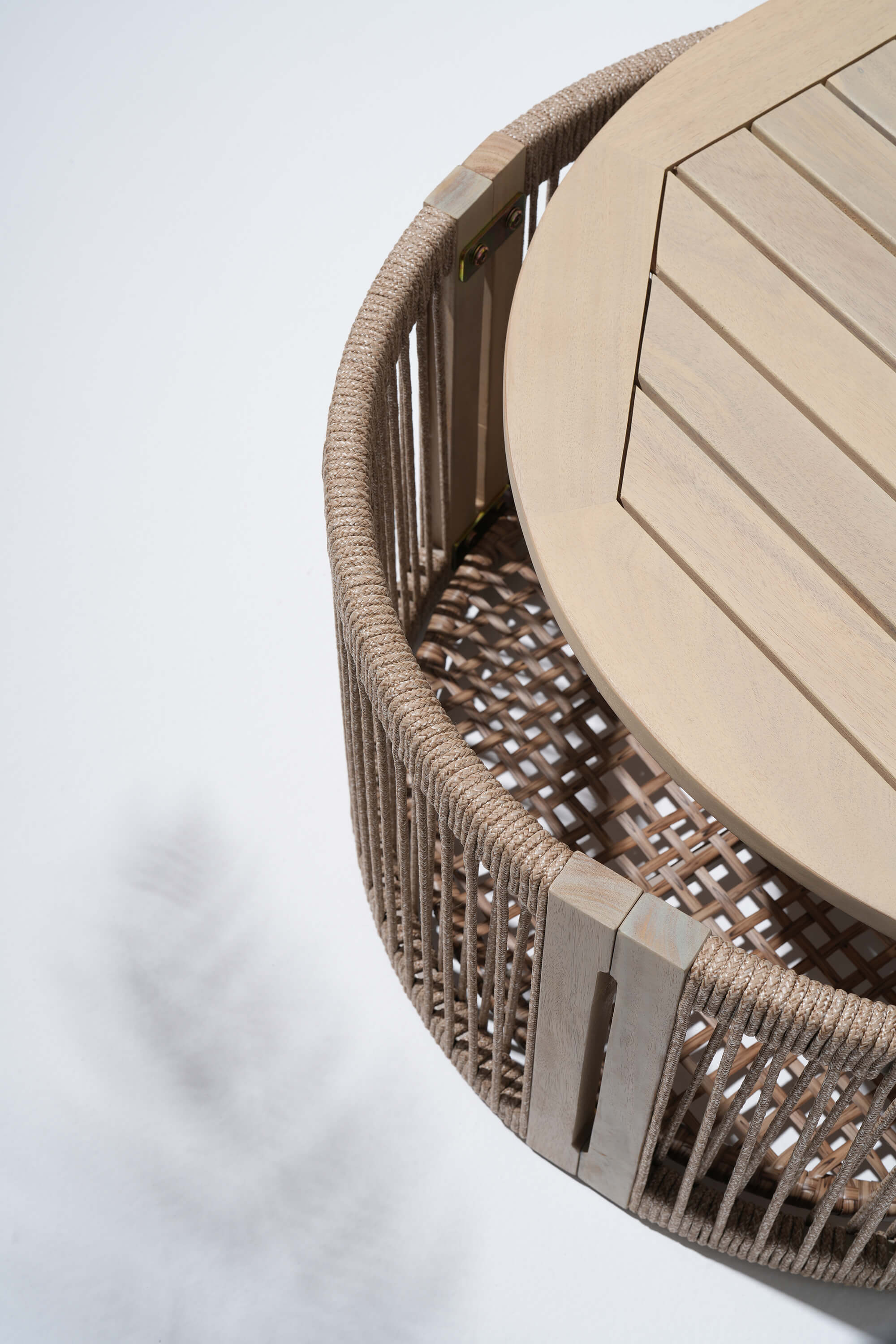 Round wooden coffee table with rope base