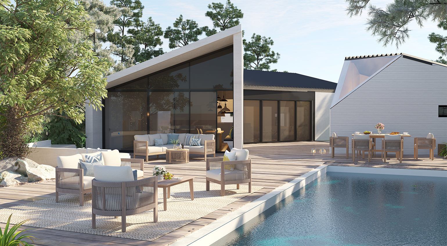 Modern outdoor living space with pool, patio furniture, and house in the background