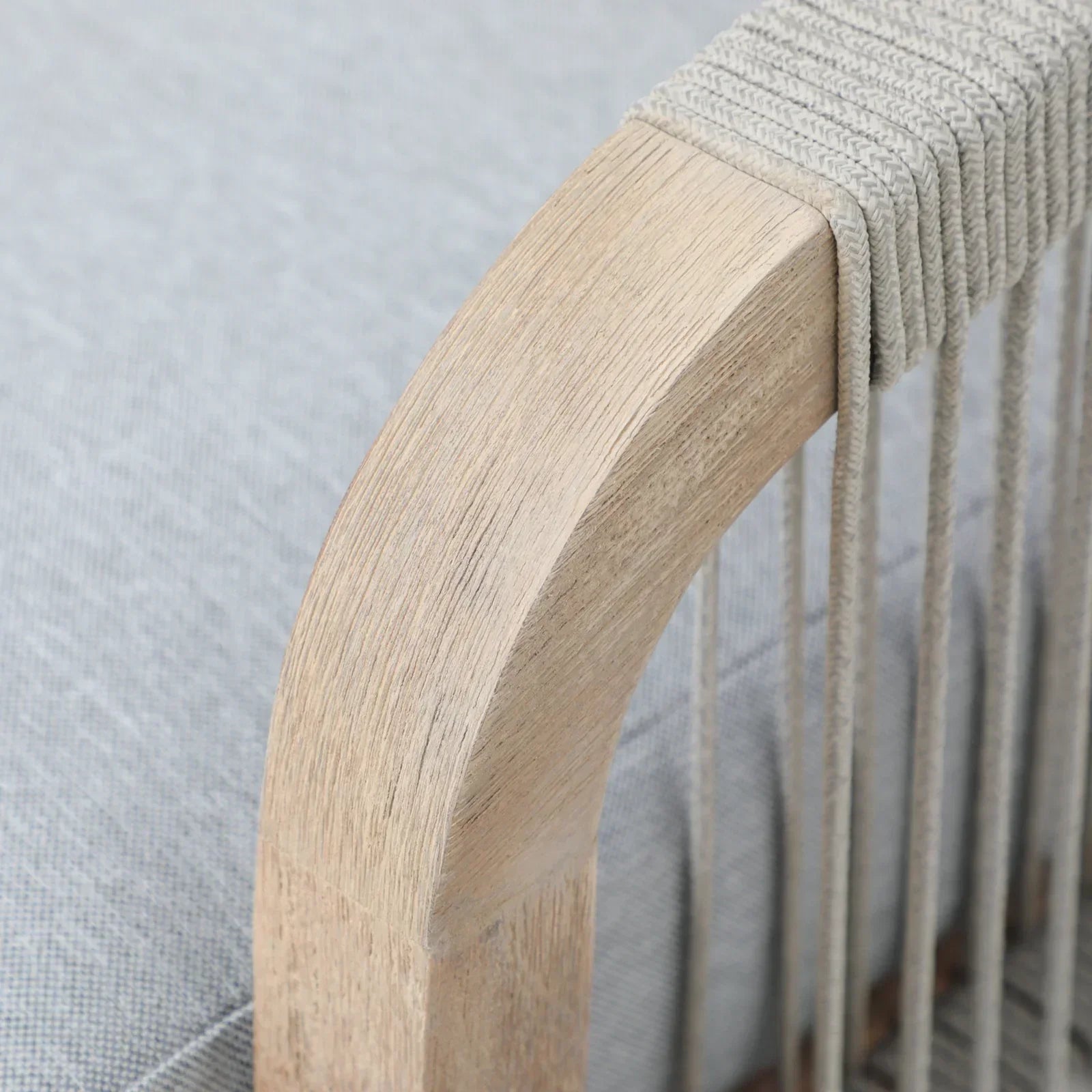 Thalea outdoor dining chair armrest with hand woven rope detail