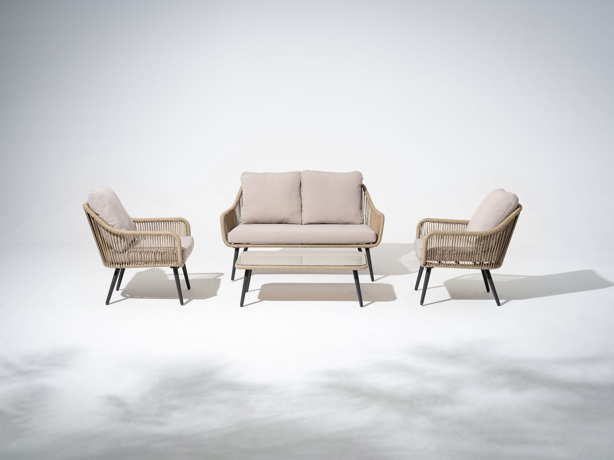 4-pcs Patio conversation seating set, dark grey steel frame, natural striped wicker design, and beige cushions, a loveset sofa, two single sofa armchairs, a rectangular coffee table with tempered glass tabletop - Jardina Premium Modern Outdoor Patio Furniture Set #Color_Natural