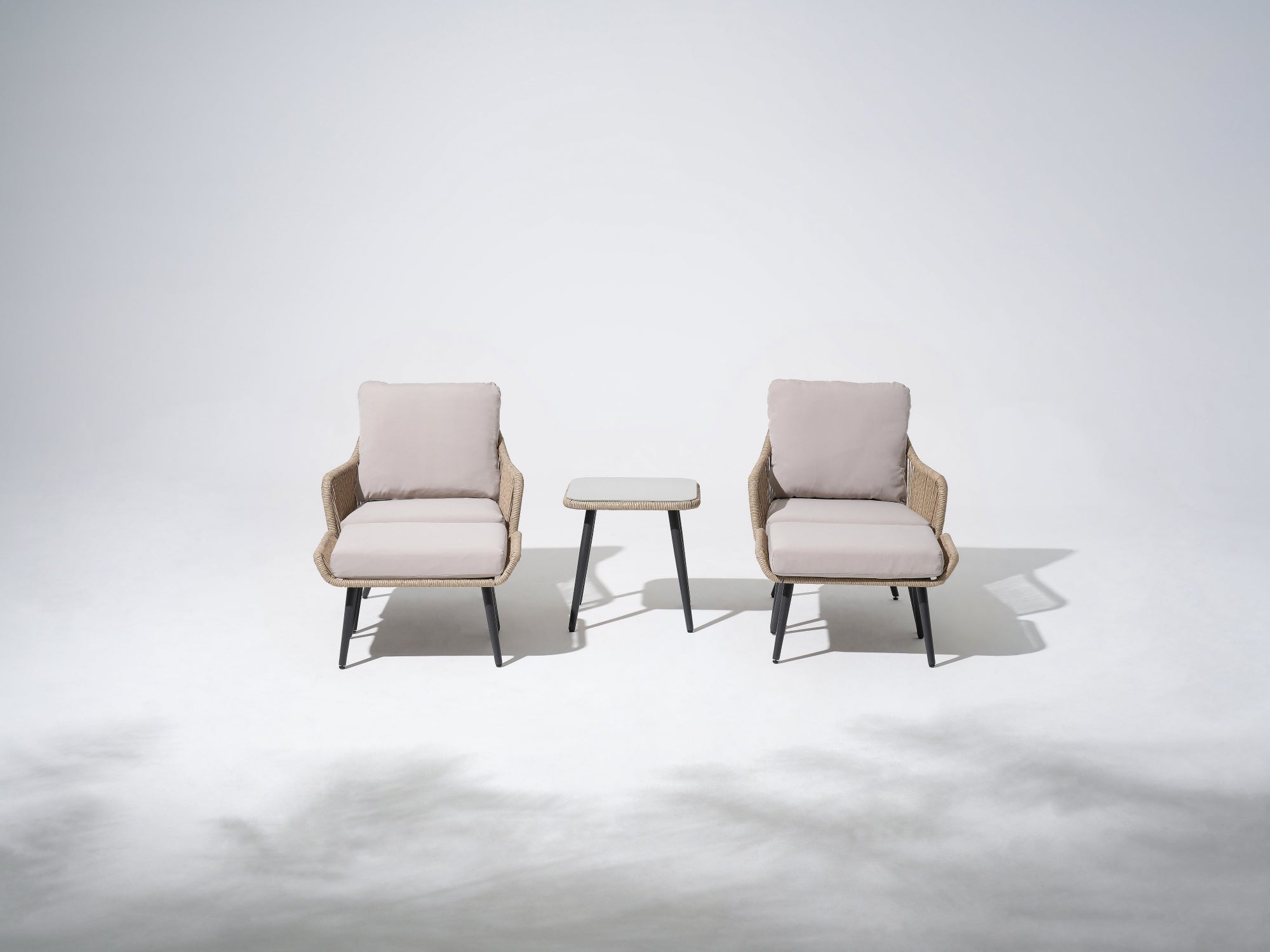 Natural 5-Piece Wicker Patio Bistro Set with beige cushions, two patio armchairs, two ottomans, and a square coffee table with tempered glass tabletop - Jardina Premium Modern Outdoor Patio Conversation Set #Color_Natural