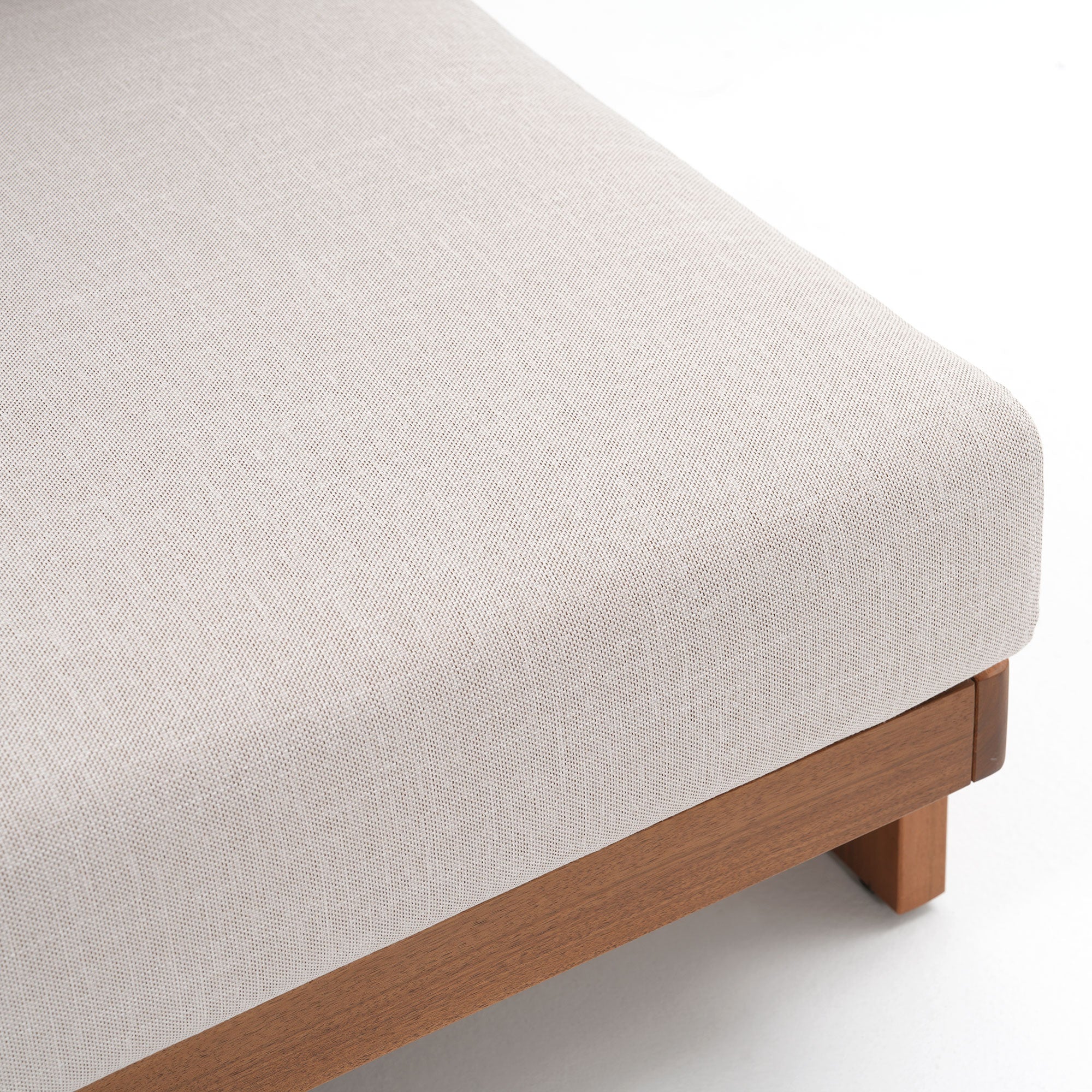 Close-up of a light gray upholstered chair with wooden legs, cushion detail- Jardina Modern Premium Outdoor Patio Furniture Sets