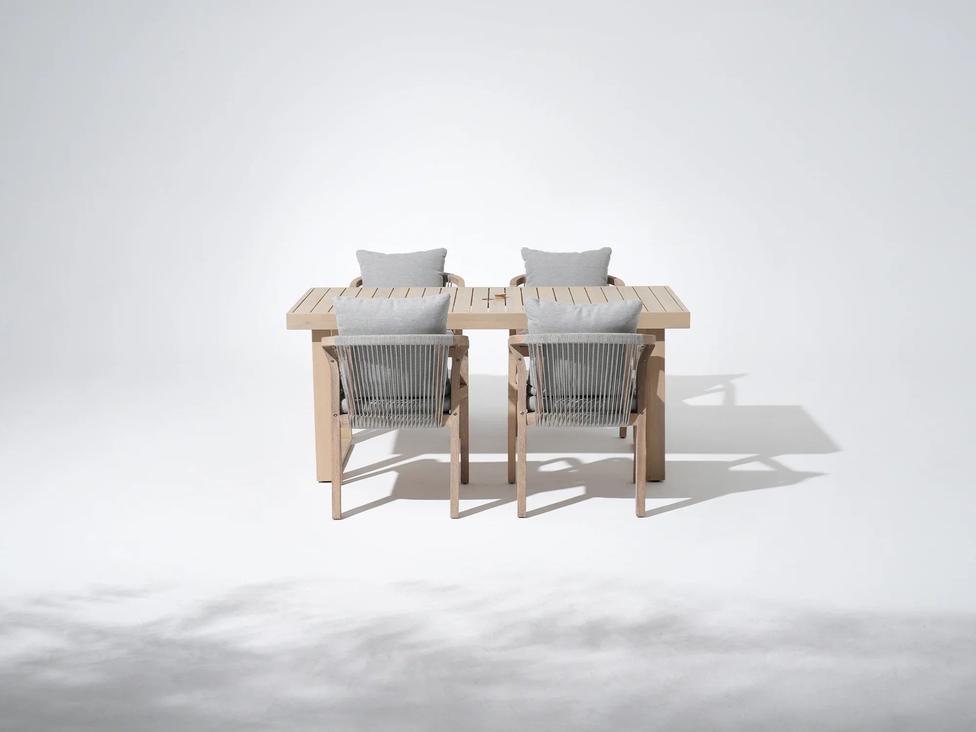 Thalea 67'' Rectangular acacia Wooden Outdoor Dining Set with 4 Rope Chairs, Sled-Leg Design & Umbrella Hole - Jardina Premium Modern Outdoor Dining Furniture