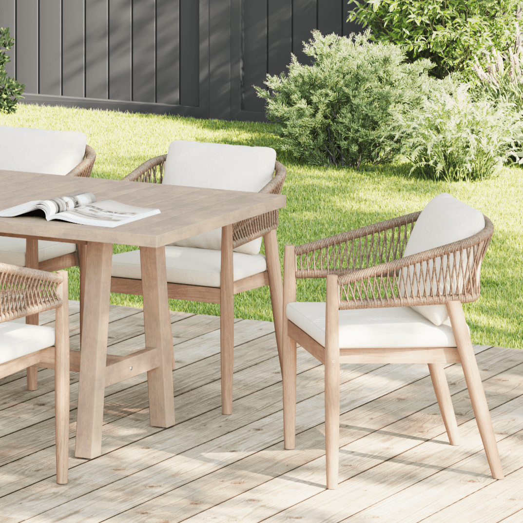 Outdoor dining set with acacia wooden table and chairs on a deck - Jardina Premium Modern Outdoor Dining Furniture