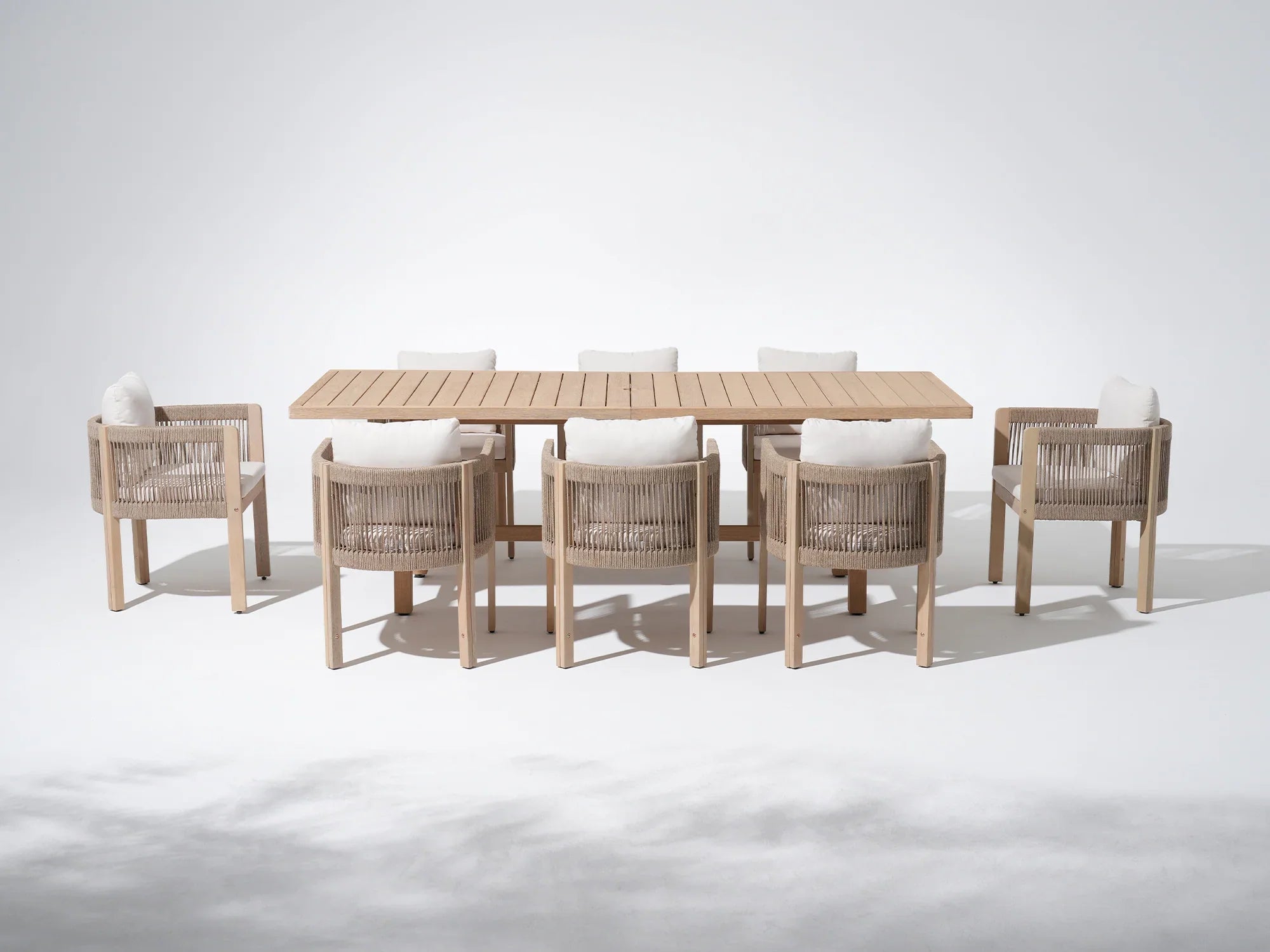 Outdoor furniture dining set with a acacia wooden umbrella hole table and woven rope chairs - Jardina Premium Modern Outdoor Dining Furniture