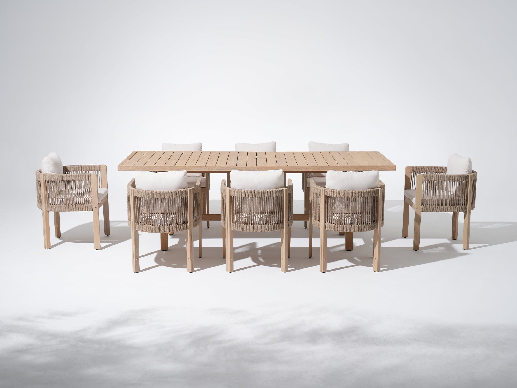 Outdoor furniture dining set with a acacia wooden umbrella hole table and woven rope chairs - Jardina Premium Modern Outdoor Dining Furniture