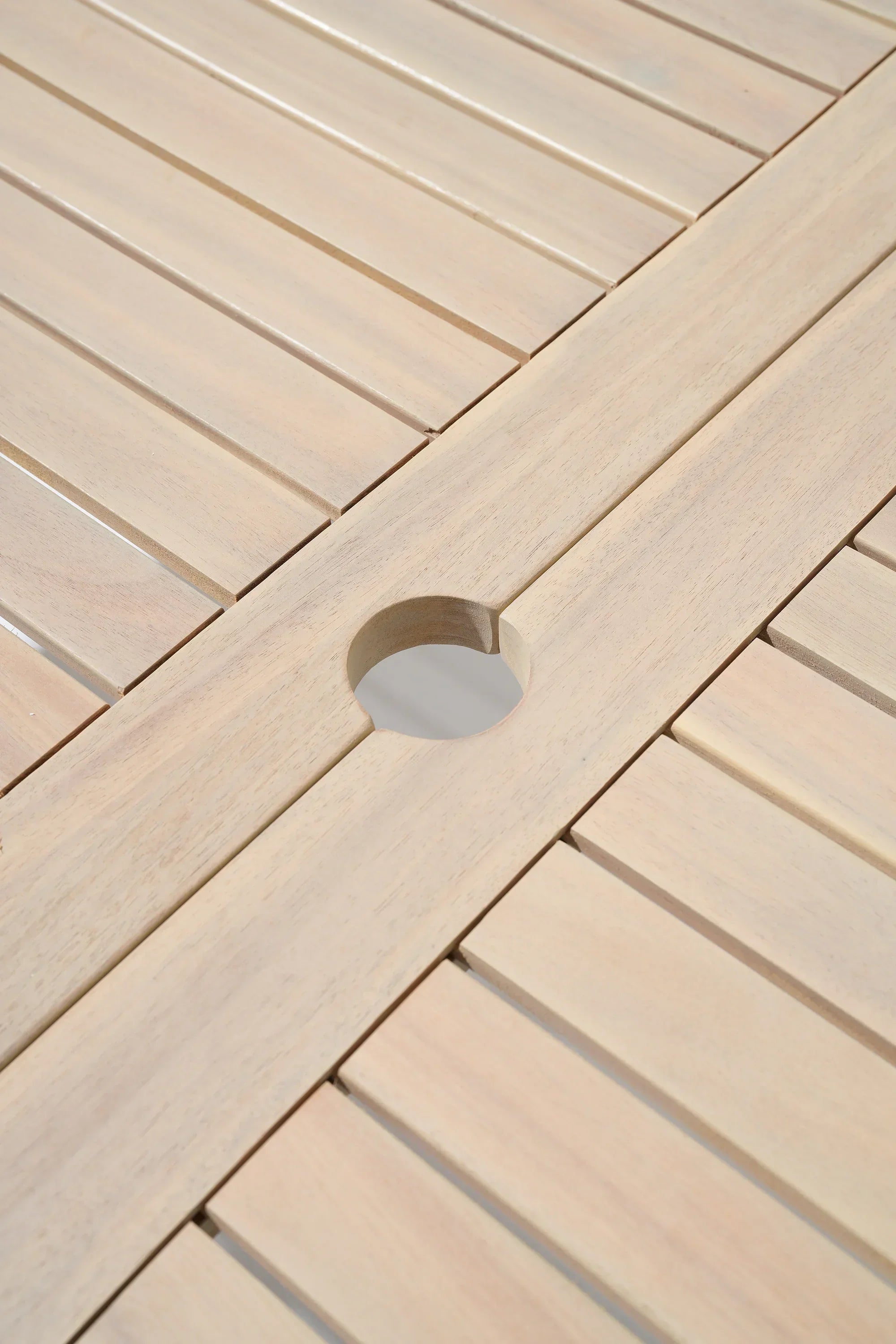 Close-up of acacia wooden dining table with an Umbrella Hole