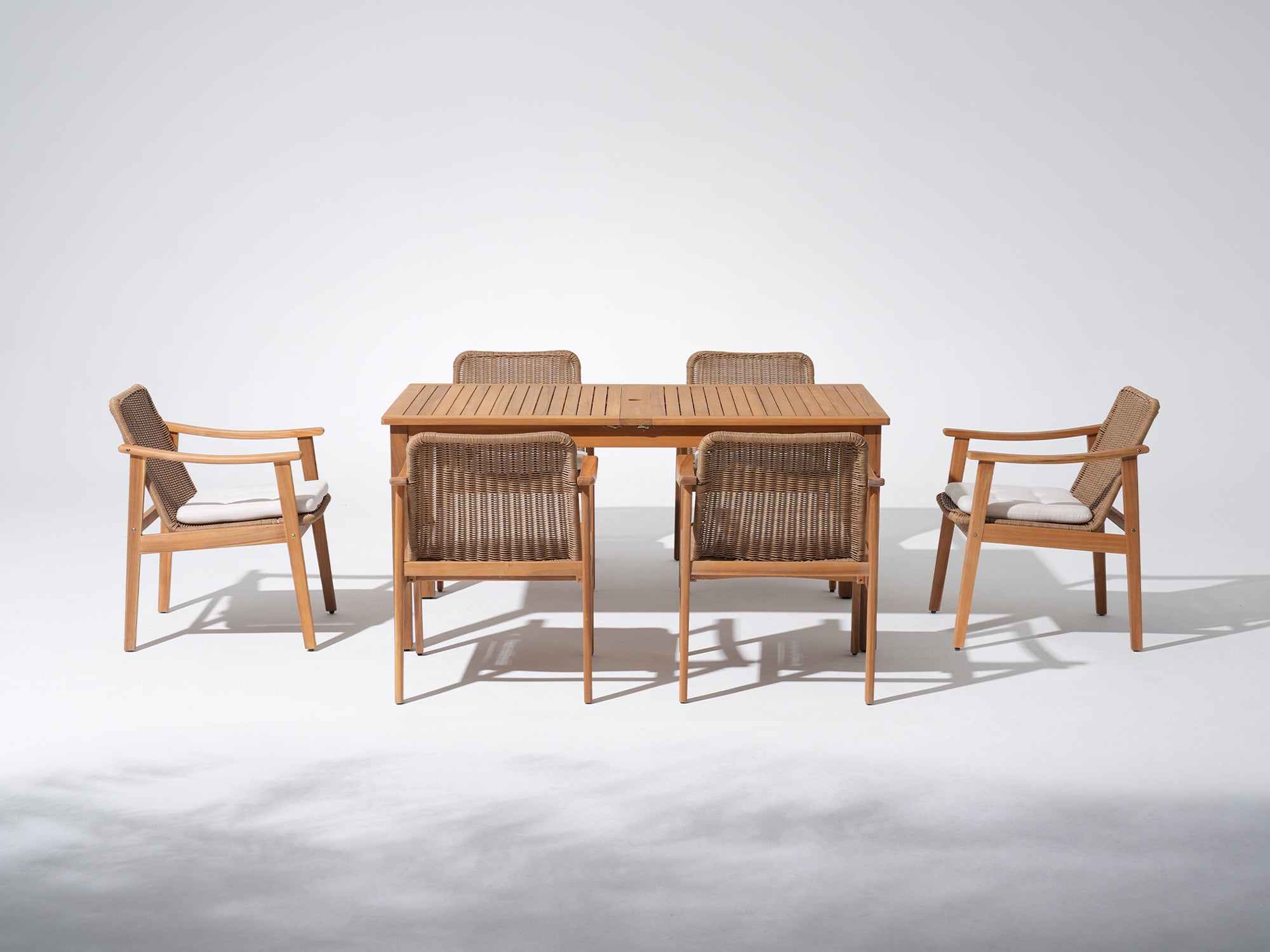 acacia Wooden umbrella hole dining table for 6 with four matching wicker chairs - Jardina Premium Modern Outdoor Dining Furniture