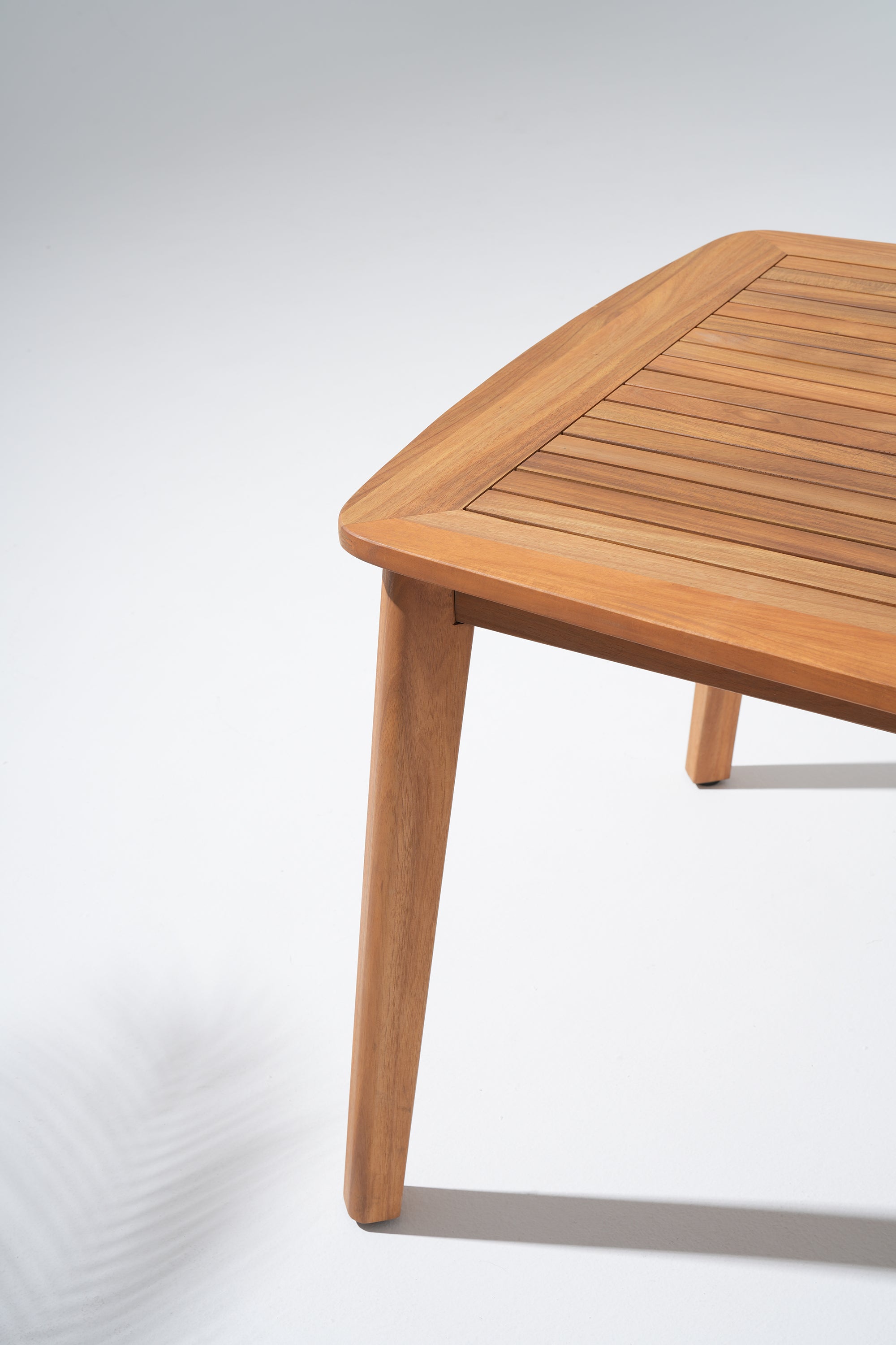 close up of acacia Wooden table leg and tabletop - Jardina Modern Premium Outdoor Patio Furniture Sets