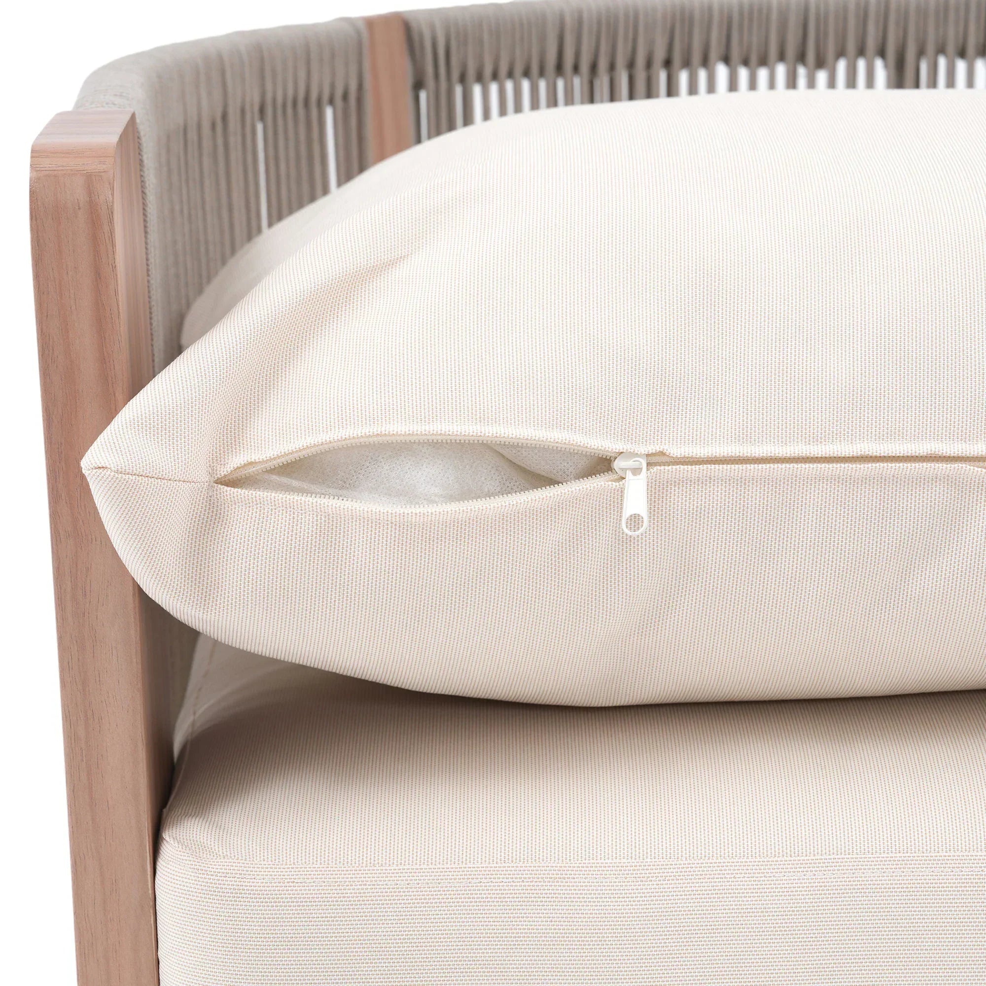 Close-up of a beige cushion on a chair with a zipper detail- Jardina Modern Premium Patio Outdoor Furniture