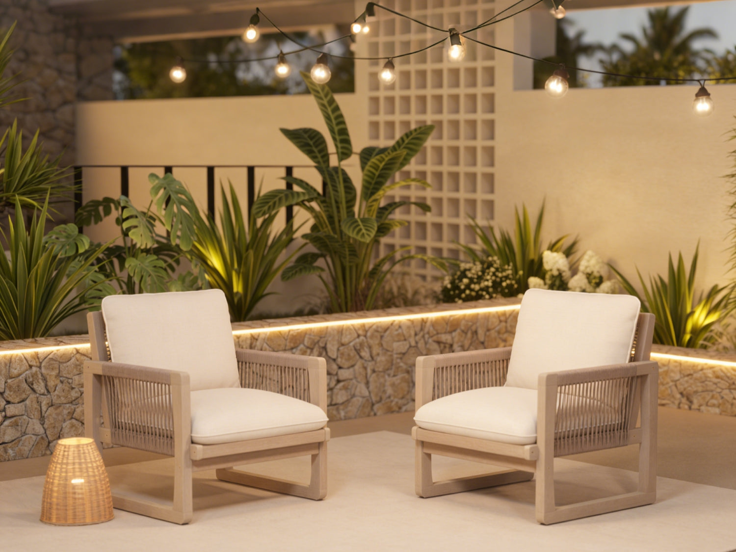 Two acacia wood outdoor lounge chairs with white cushions, rope design
