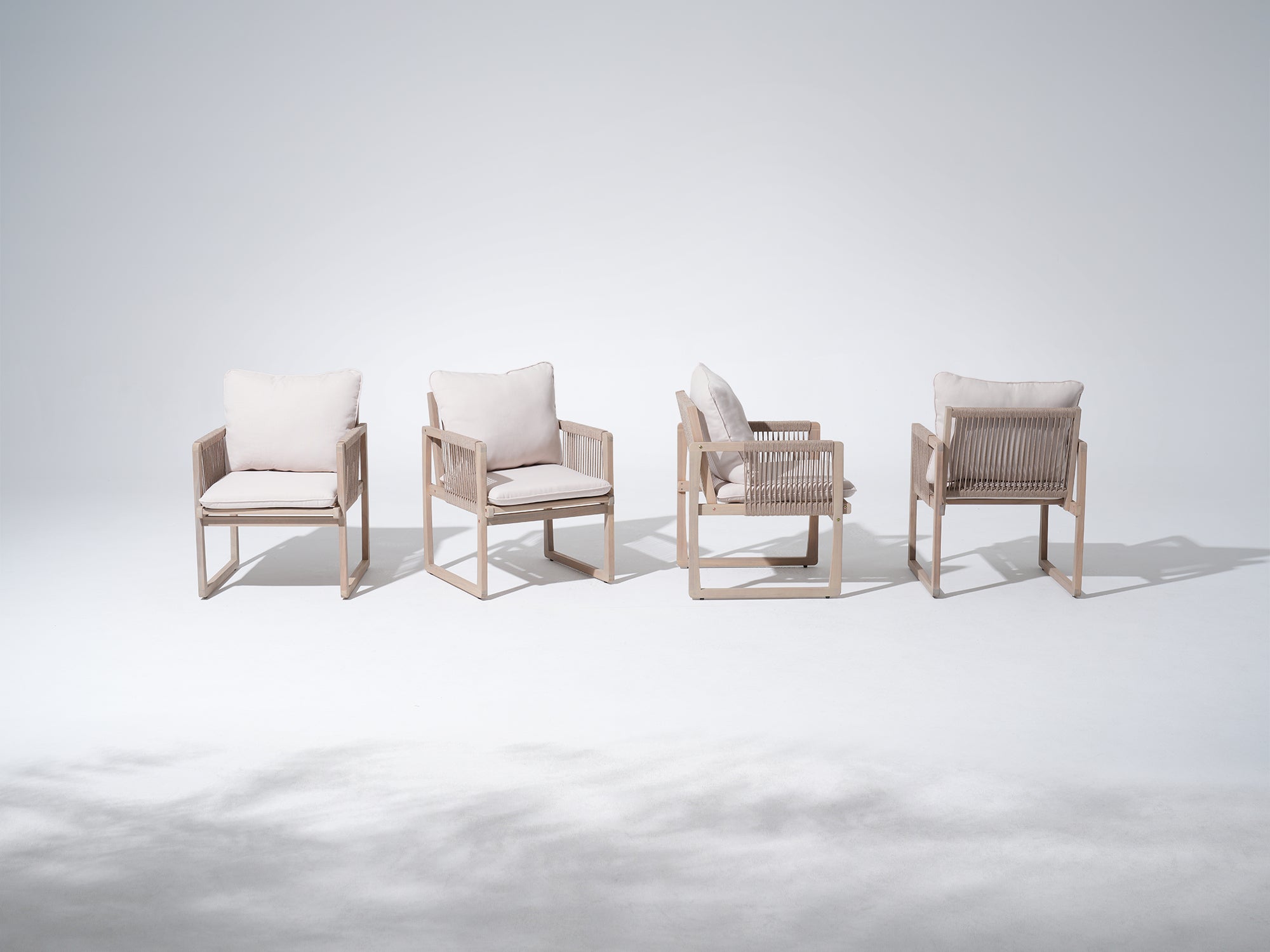 Four acacia wooden modern dining rope chairs with white cushions - Jardina Premium Modern Outdoor Dining Furniture