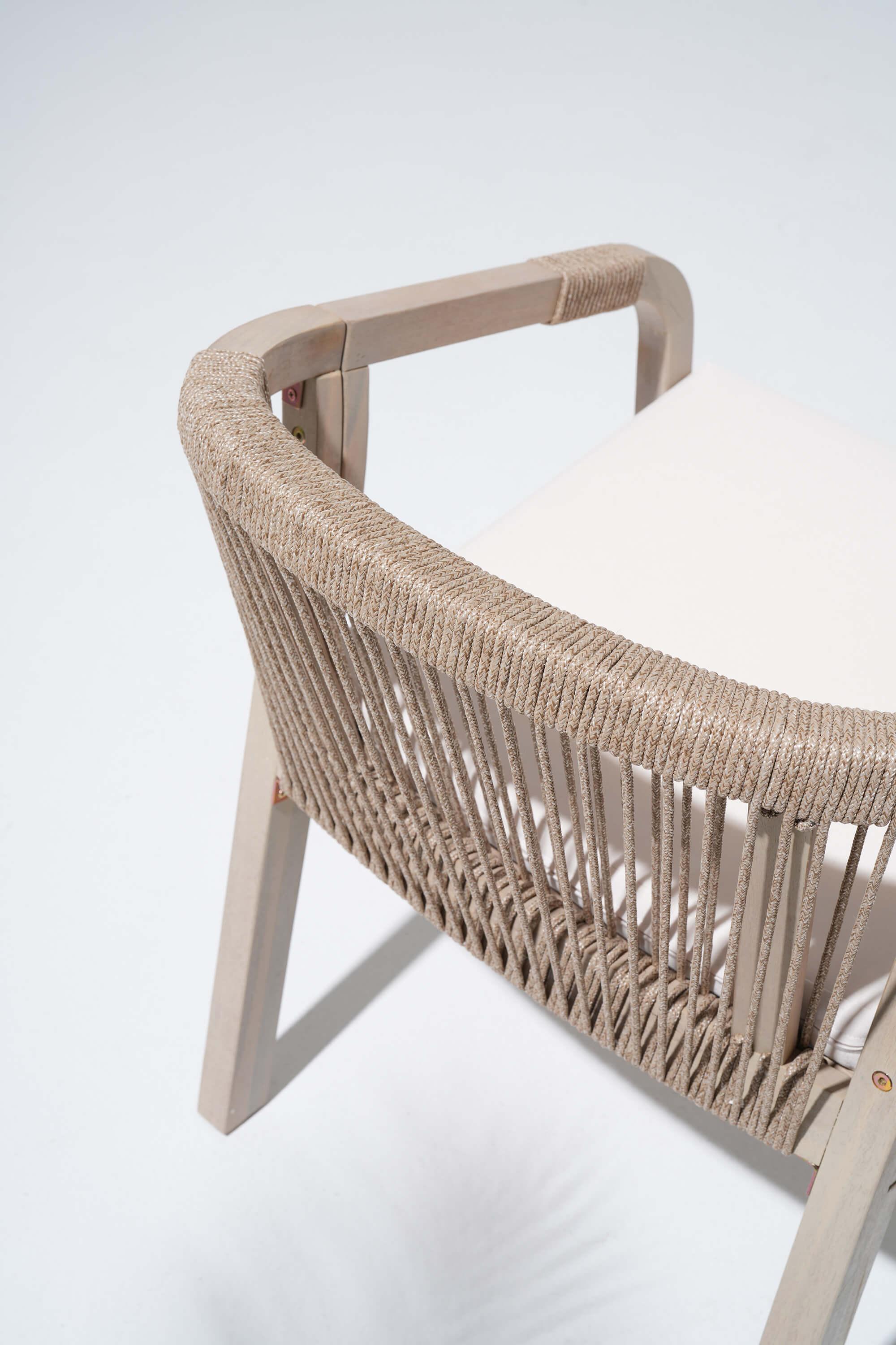 Woven chair with acacia wooden frame armrest