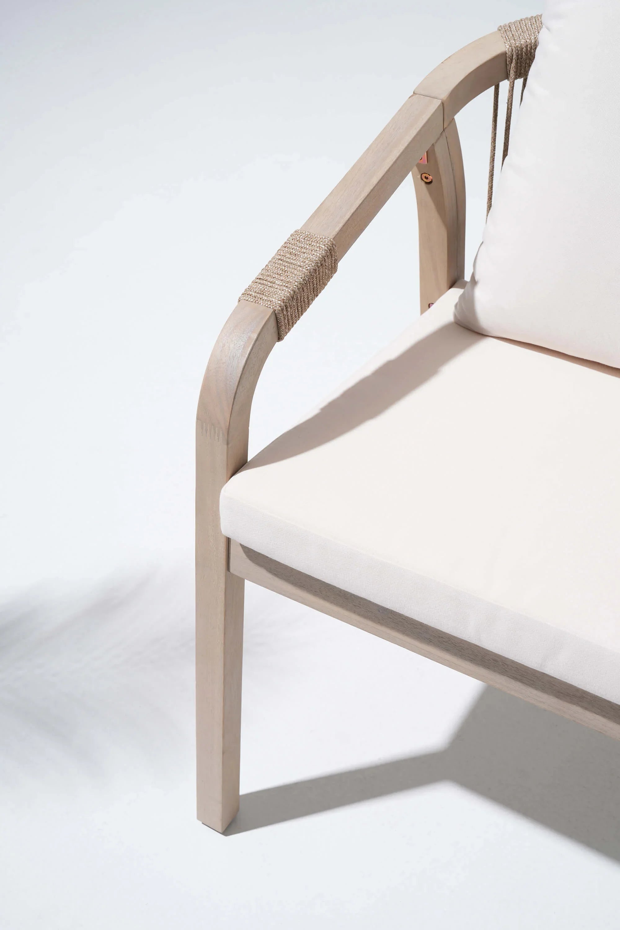 Chair with beige acacia wood frame and white cushion