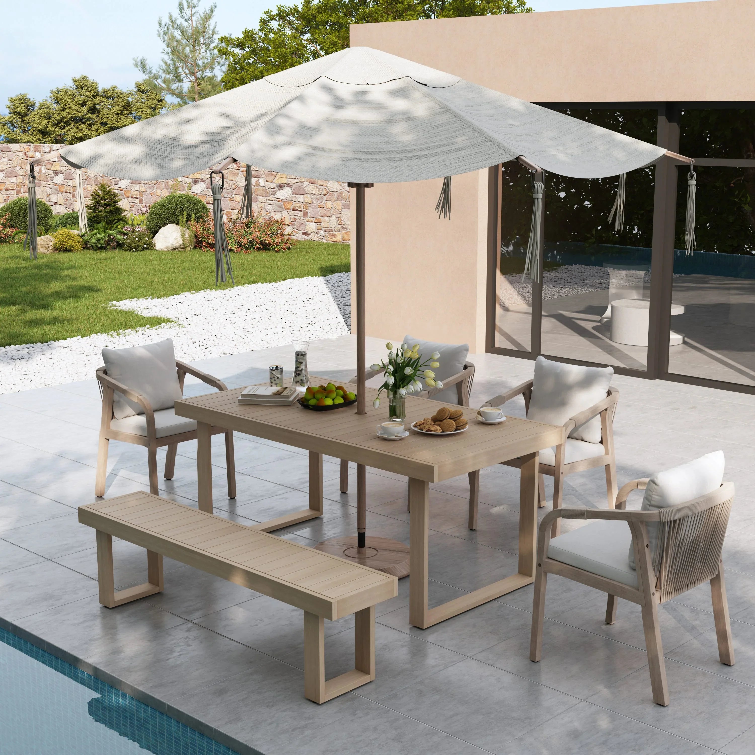 acacia wood Outdoor dining set for 6 with table, chairs, and bench under a large umbrella by a pool - Jardina Premium Modern Outdoor Dining Furniture