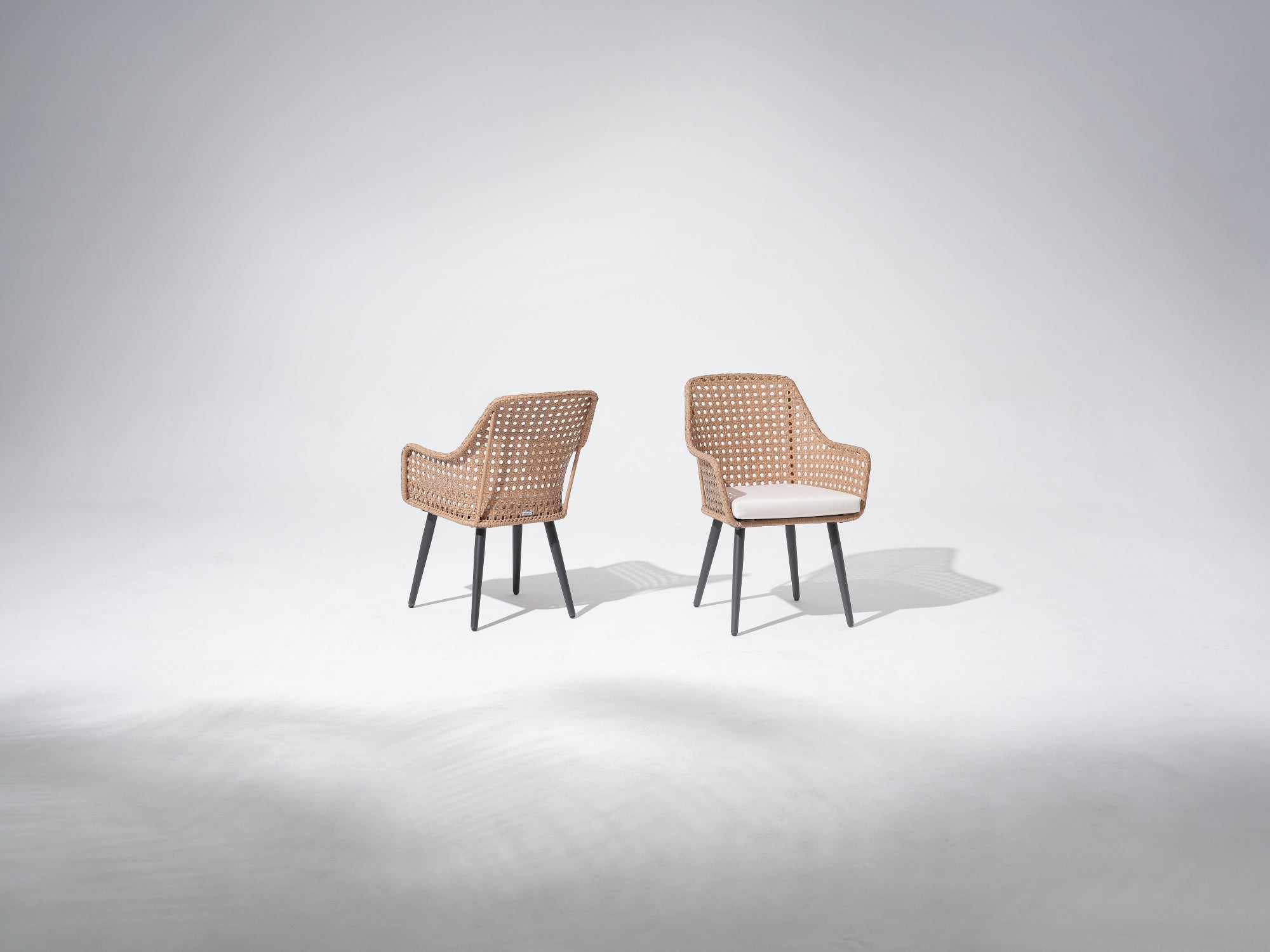 Outdoor Patio chairs, dark grey steel frame, yellow hollow pattern rattan design, and beige seat cushions - Jardina Premium Modern Outdoor Patio Dining Furniture