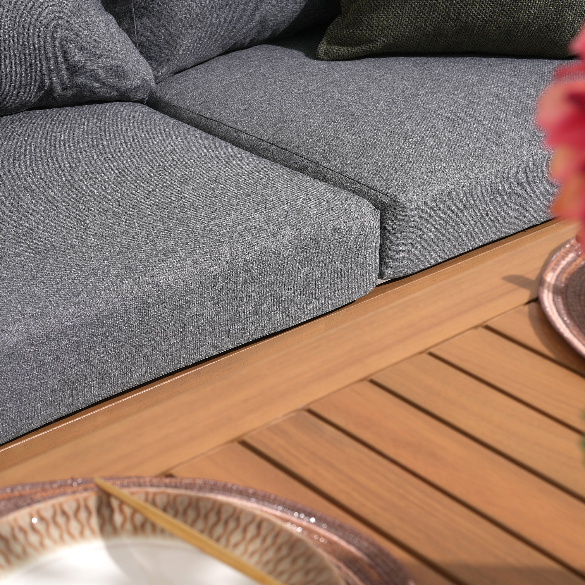 Gray sectional sofa with a wooden coffee table on a wooden deck- Jardina Modern Premium Patio Outdoor Furniture