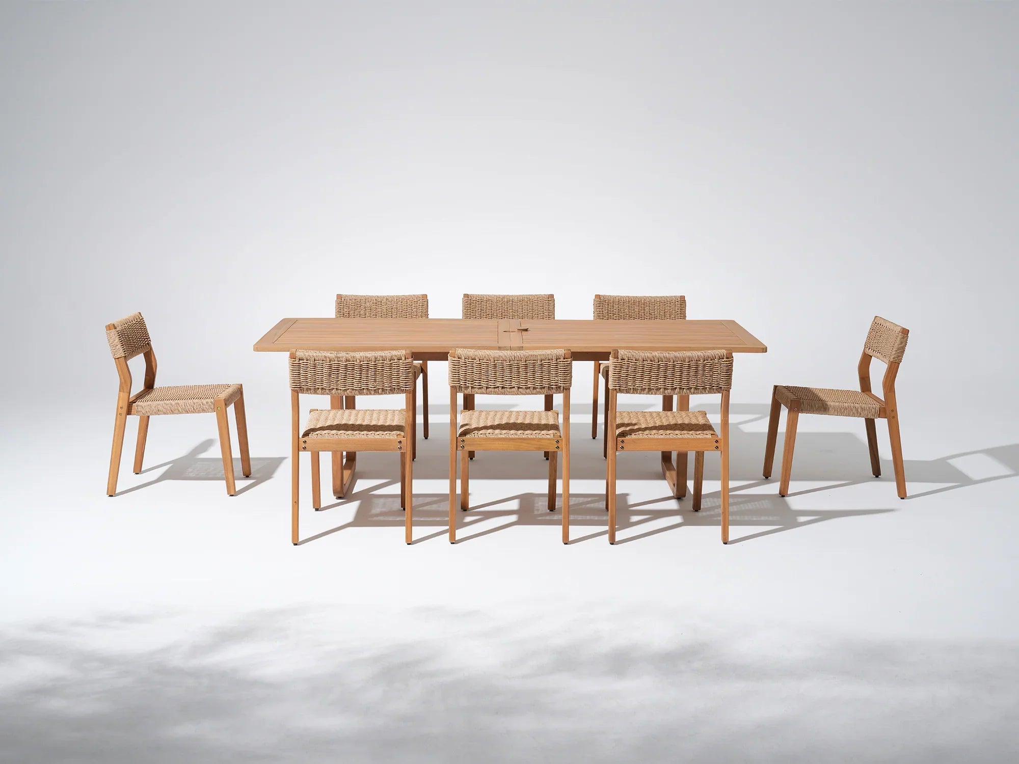 acacia Wooden patio dining table with umbrella hole for 8 people, wicker design armless chair - Jardina Premium Modern Outdoor Dining Furniture