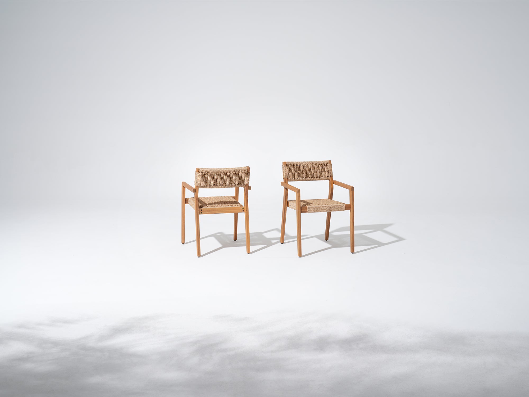 Two acacia wooden armchairs with woven seats - Jardina Premium Modern Outdoor Dining Furniture