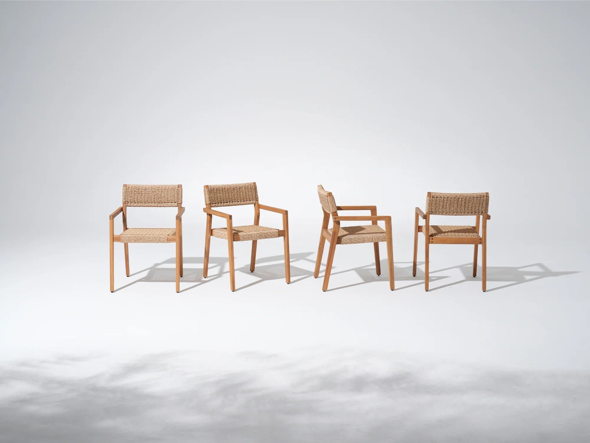 Four acacia wooden armchairs with woven seats - Jardina Premium Modern Outdoor Dining Furniture