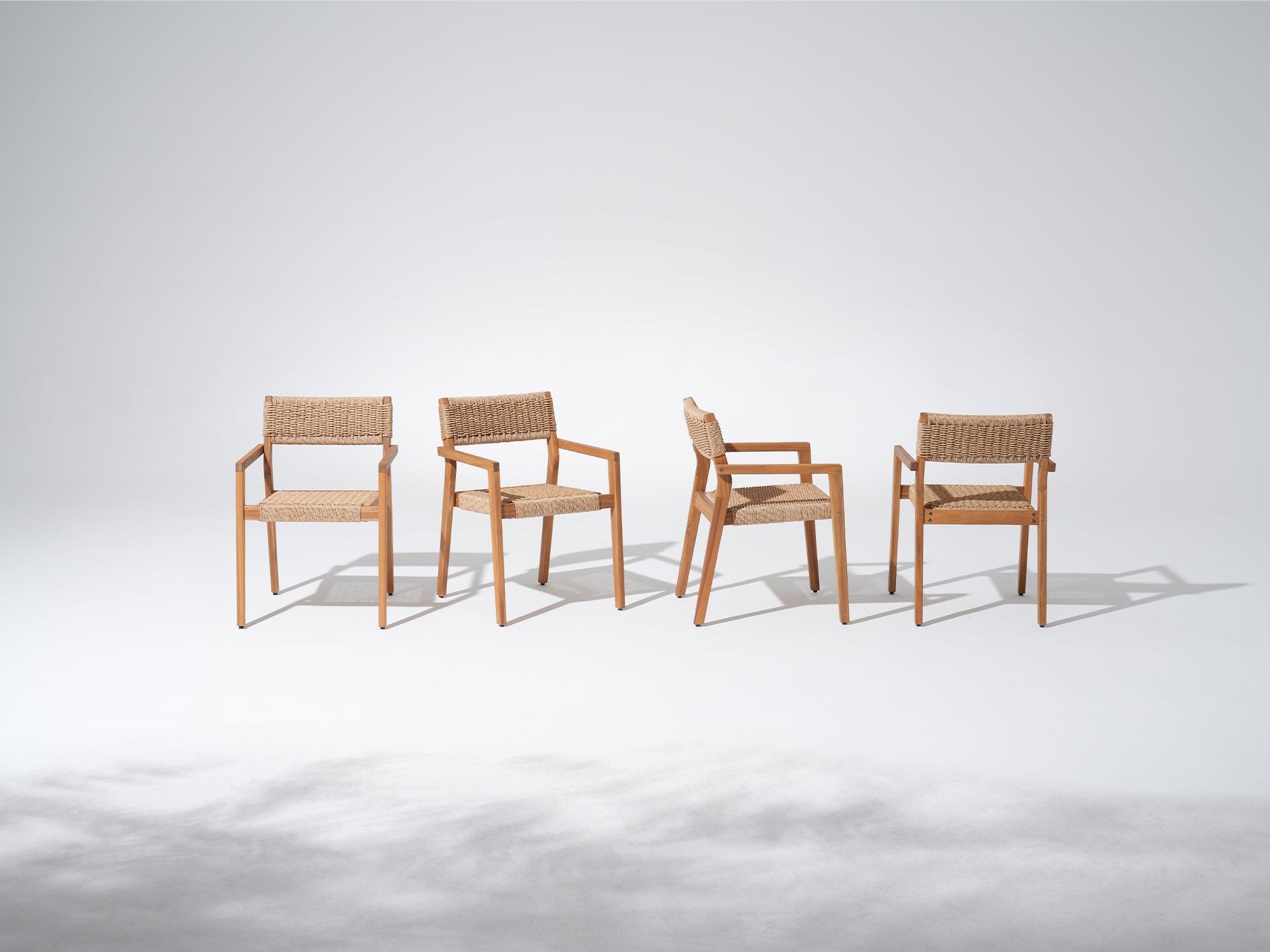 Four acacia wooden armchairs with woven seats - Jardina Premium Modern Outdoor Dining Furniture