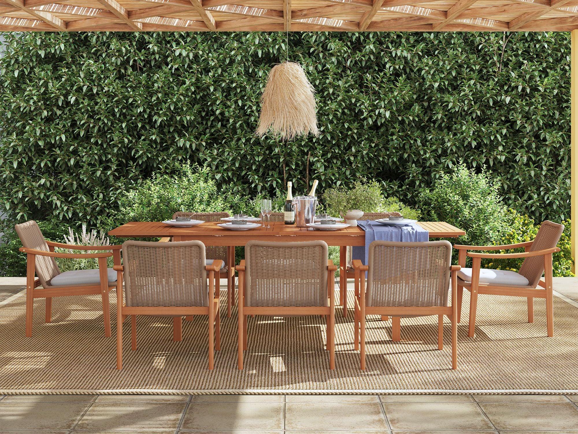 Outdoor dining set for 8 with acacia wooden table and woven rattan chairs on a patio - Jardina Premium Modern Outdoor Dining Furniture