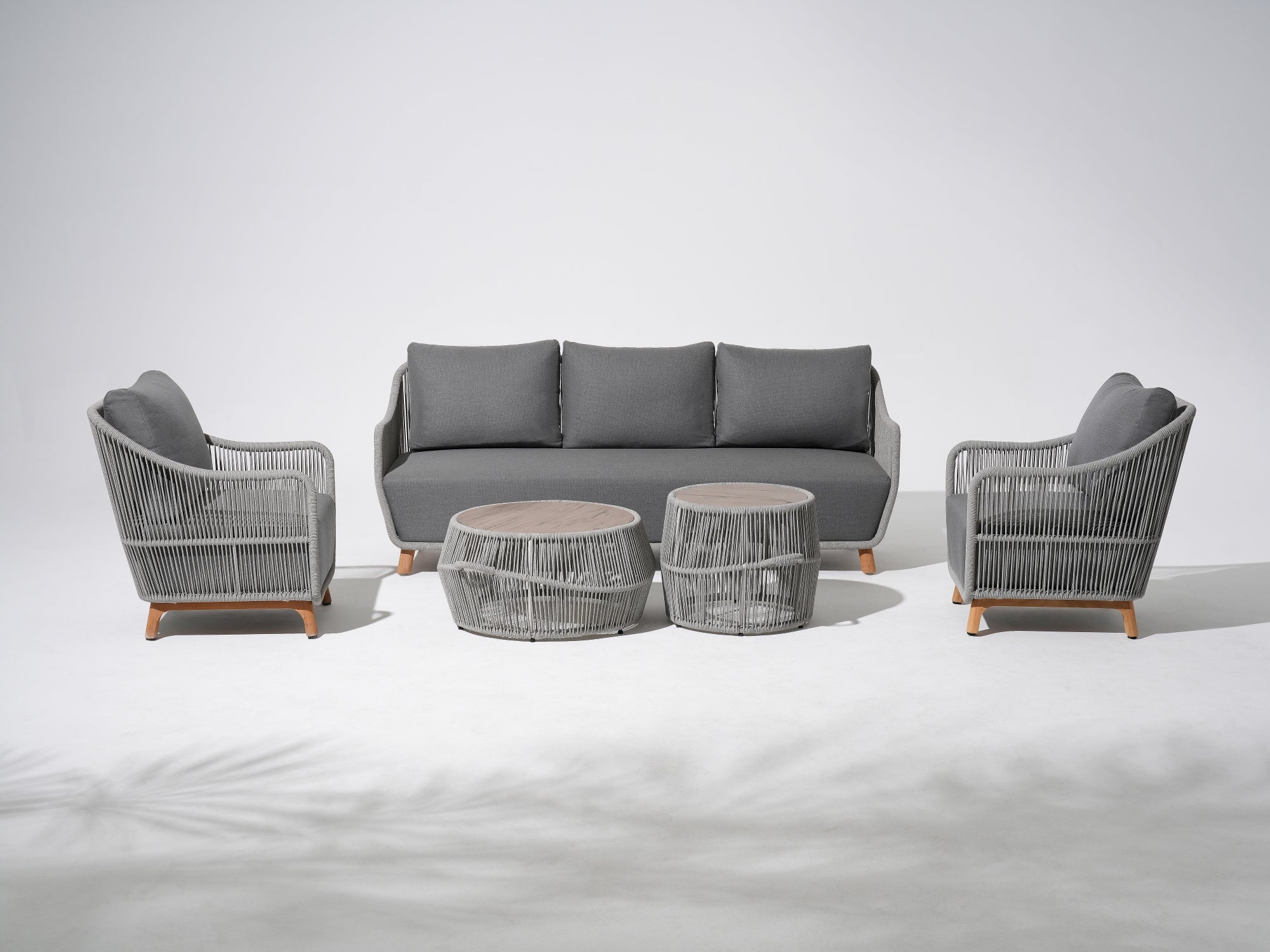 5-pcs Outdoor seating conversation set with gray seat cushions and back cushions, a 3-seat sofa, two single sofa armchairs with gray rope design, two round outdoor coffee tables with the same rope design - Jardina Premium Modern Outdoor Patio Furniture Set