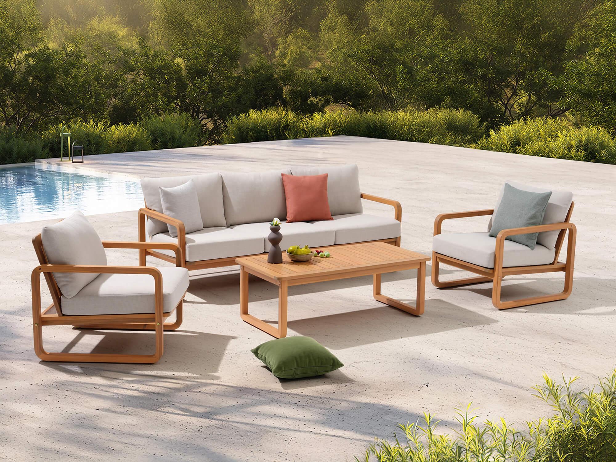 4-pc acacia wood outdoor furniture conversation set with sofa, chairs, and coffee table by a poolside - Jardina Modern Premium Outdoor Patio Furniture Sets