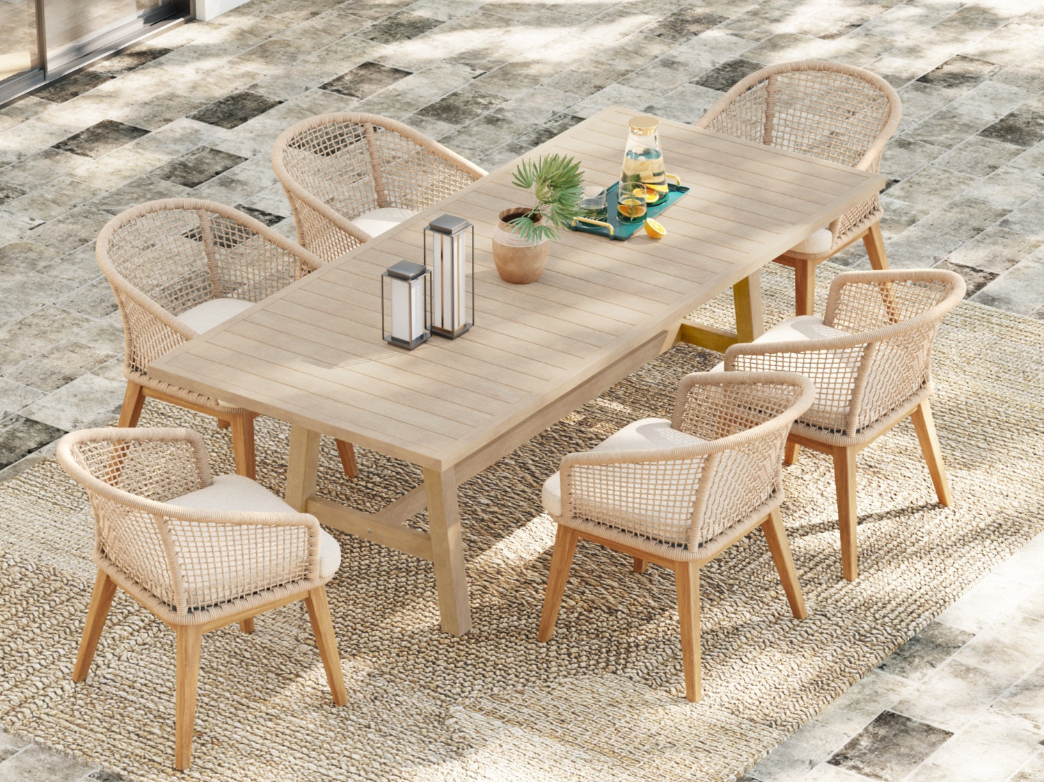 Outdoor dining set for 6 with a wooden table and wicker chairs on a textured patio- Jardina Modern Premium Patio Outdoor Furniture