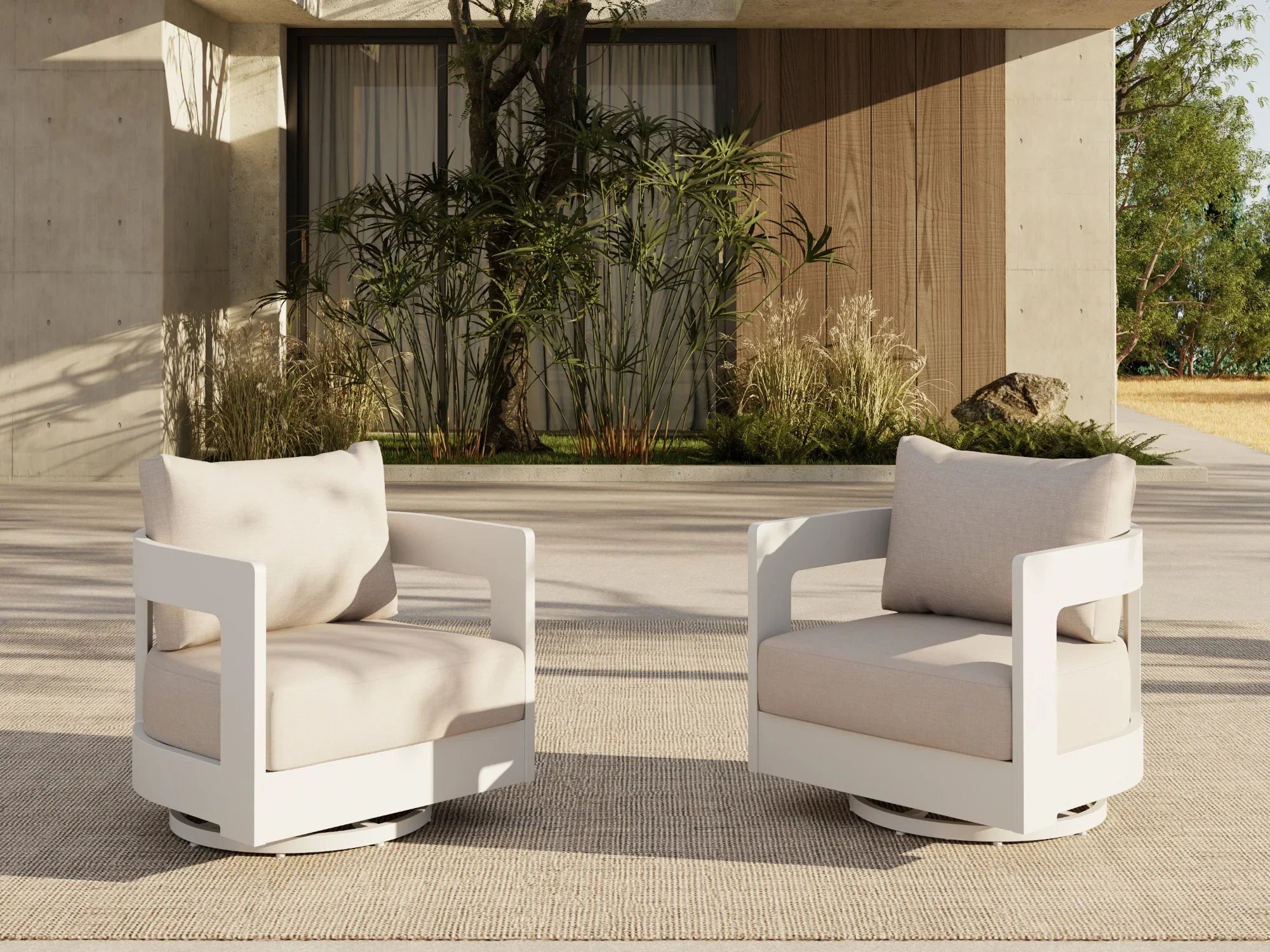 Two modern white aluminum swivel chairs with beige cushions