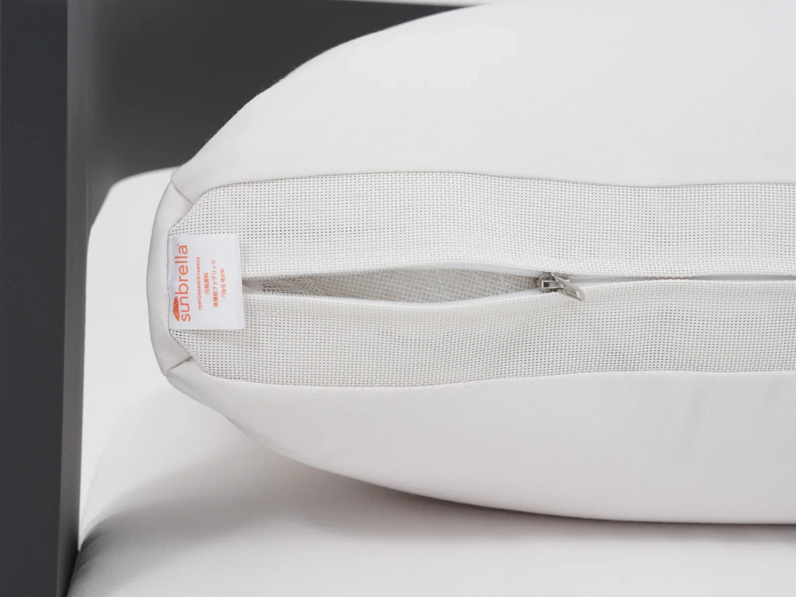 Close-up of a white Sunbrella® cushions